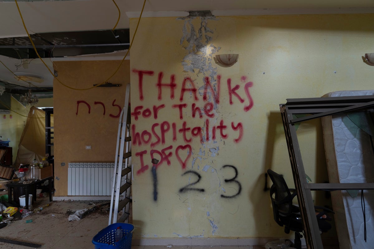 AP PHOTOS: Graffiti left by Israeli soldiers turn south Lebanon homes into a canvas of war