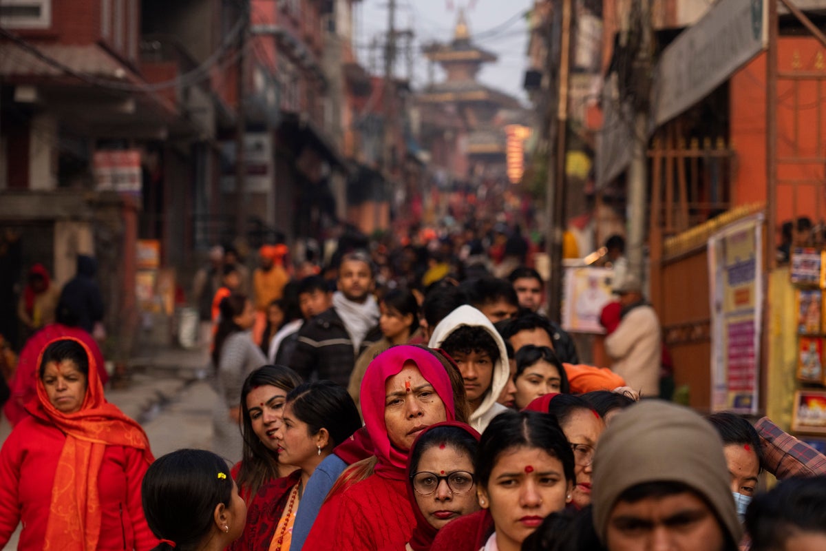 Tens of thousands gather for Hindu festival at Nepal temple, with many lighting up marijuana joints