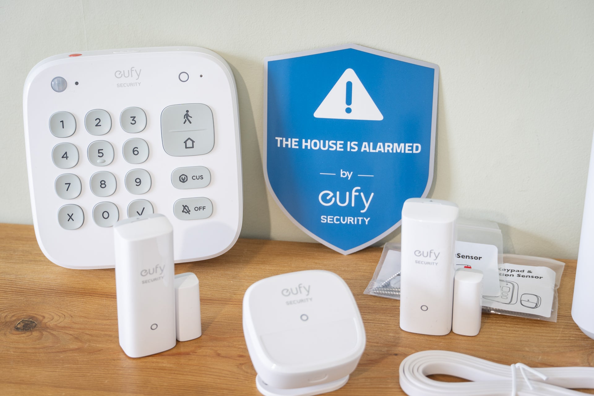 The kit includes a wireless keypad and battery-powered motion sensor