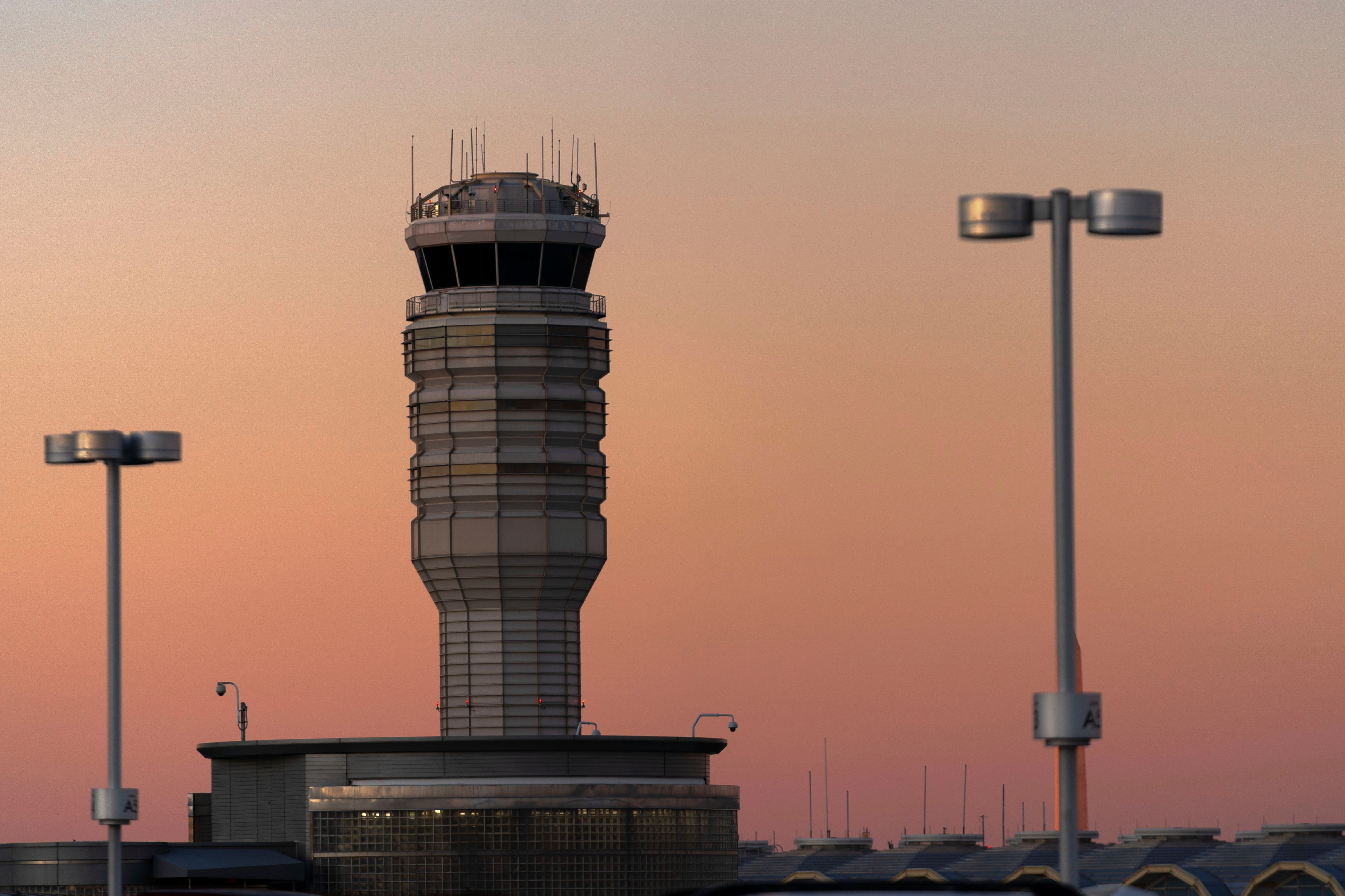 FILE - The air traffic control tower at Ronald Reagan Washington National Airport