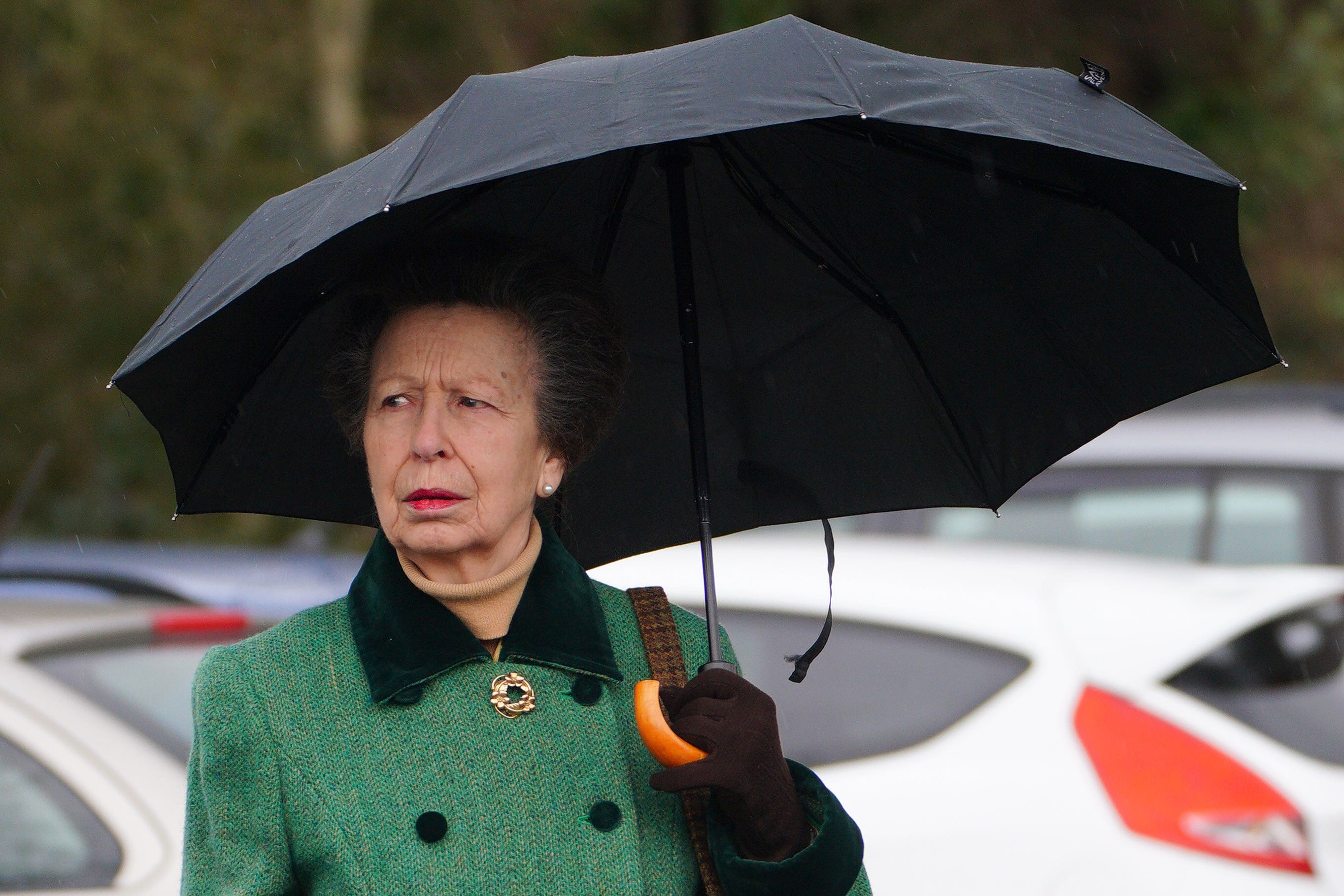 The Princess Royal experienced heavy rain in Lydney (Ben Birchall/PA)