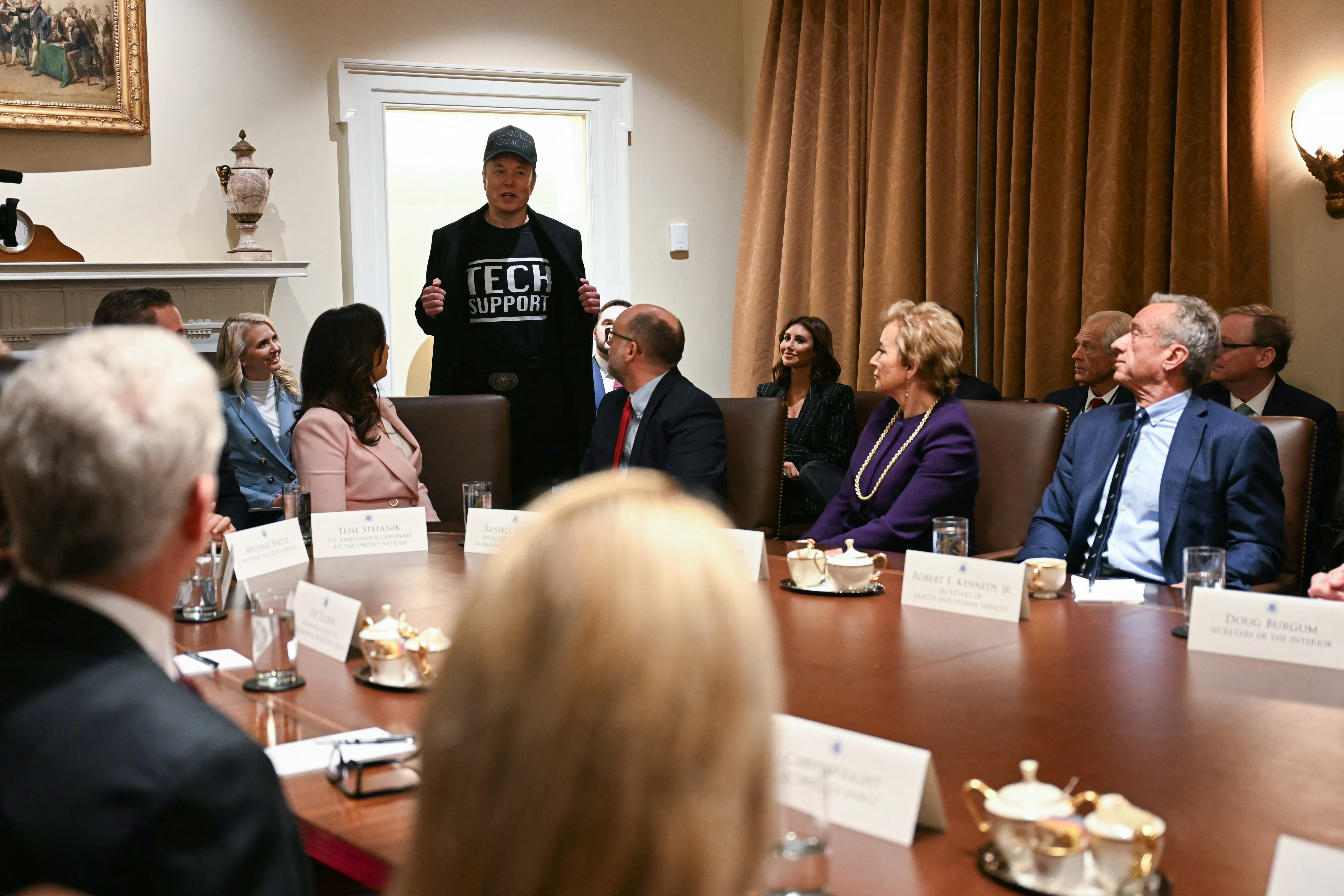 Elon Musk speaks during the first cabinet meeting of Donald Trump’s second term and revealed his DOGE team has been getting death threats