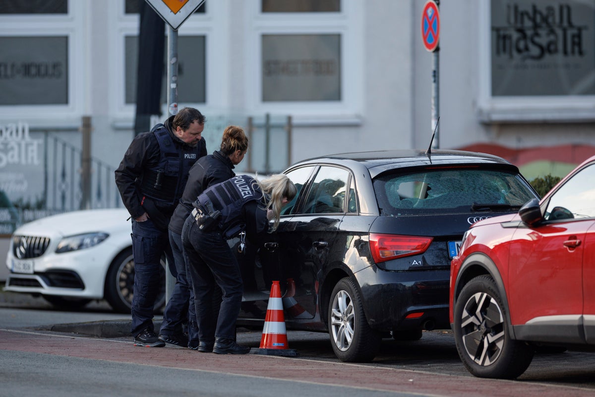 4 people hurt as shots are fired near a courthouse in western Germany