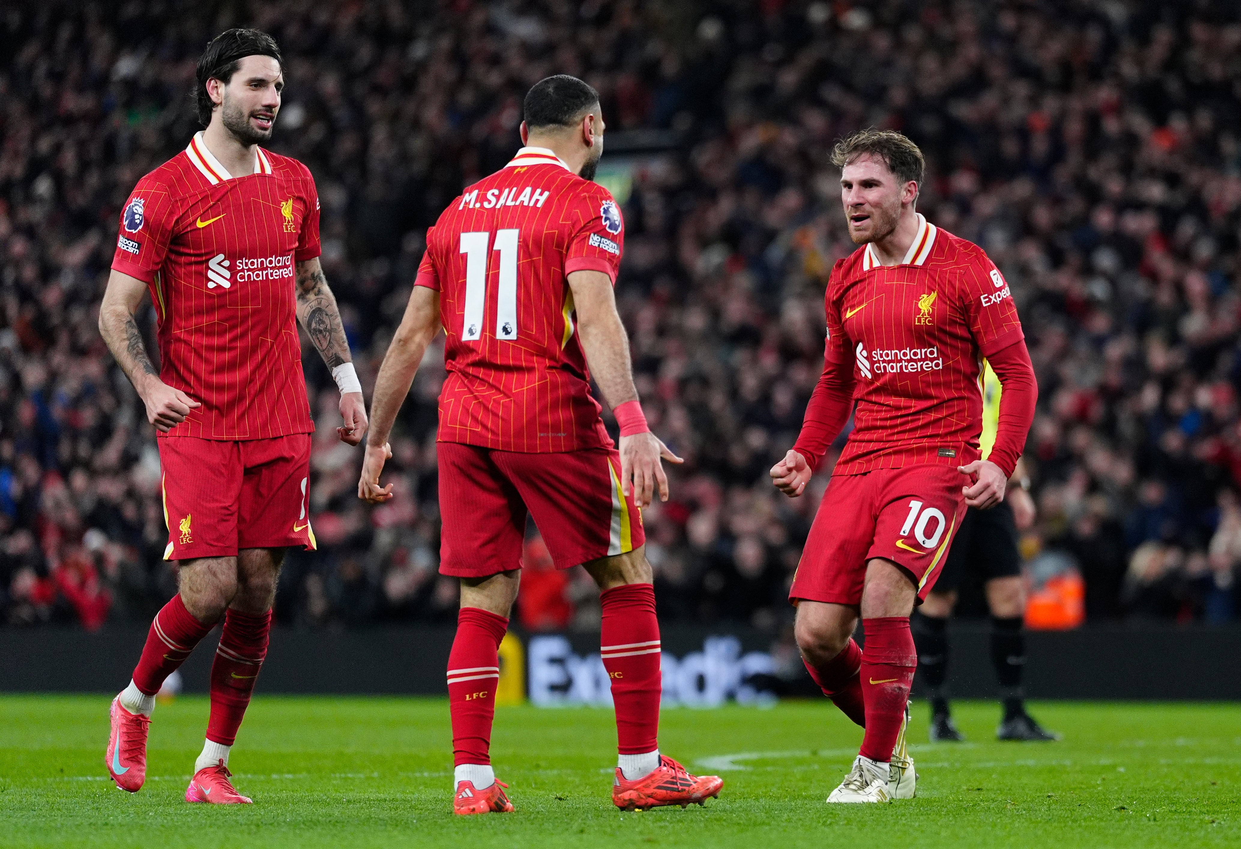 Liverpool moved 13 points clear at the top of the Premier League with win over Newcastle