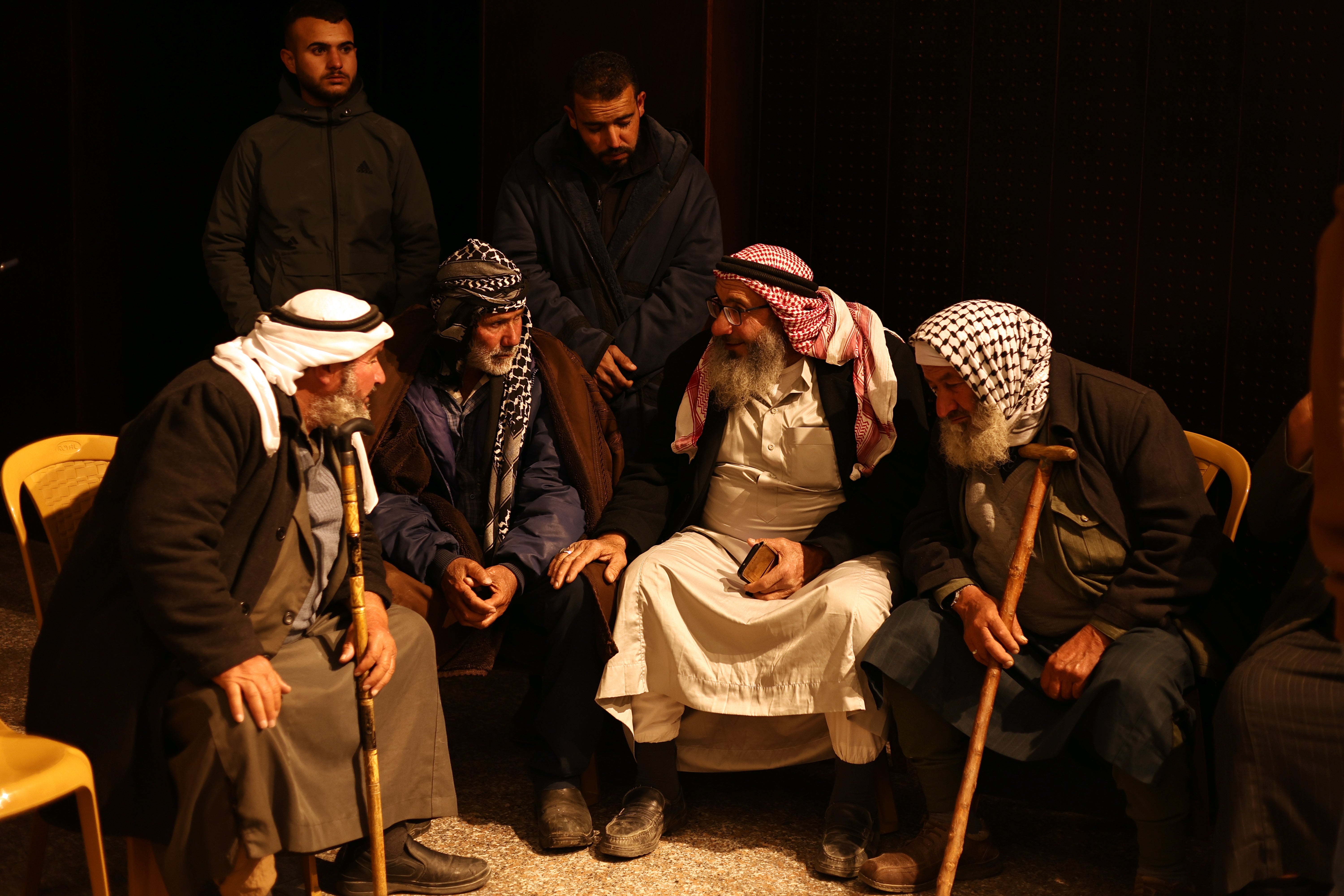 Palestinians wait for the release of their relatives from Israeli prisons, at Ramallah Cultural Palace in the West Bank city of Ramallah