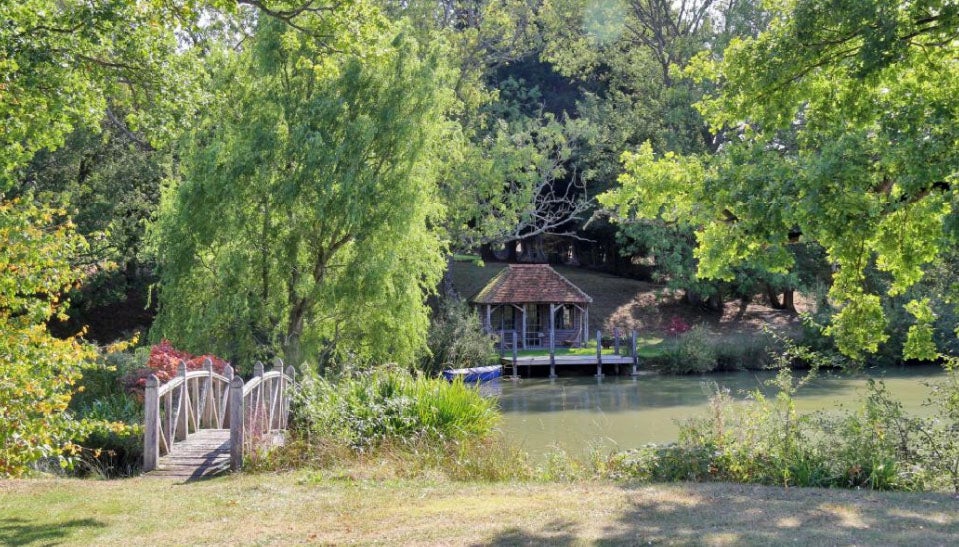 Crowbourne Farm is made up of a sprawling Grade II-listed farmhouse with its own wine cellar, a separate guest cottage, studio, barn and workshop, a quadruple car port and over ten acres of grounds, including a tennis court, stables, woods and two lakes