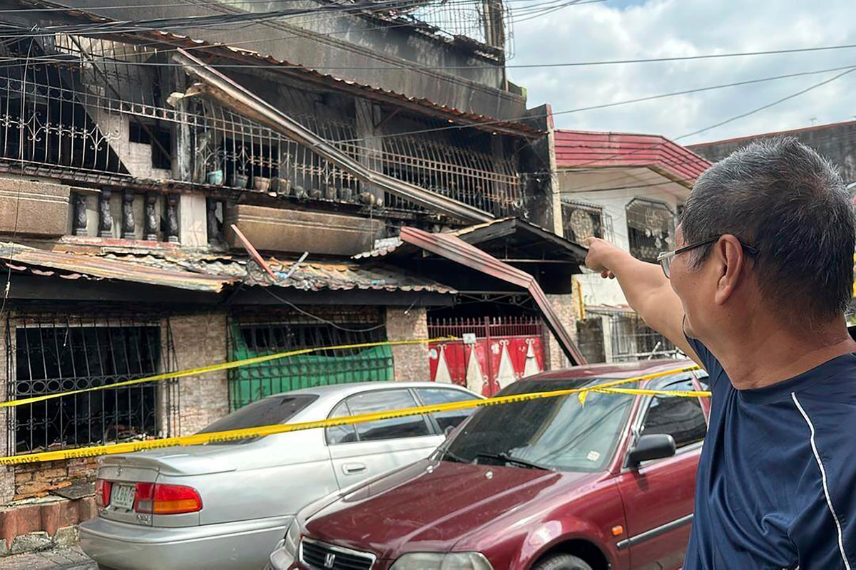 8 killed in Philippine fire that gutted a residential building in less than an hour