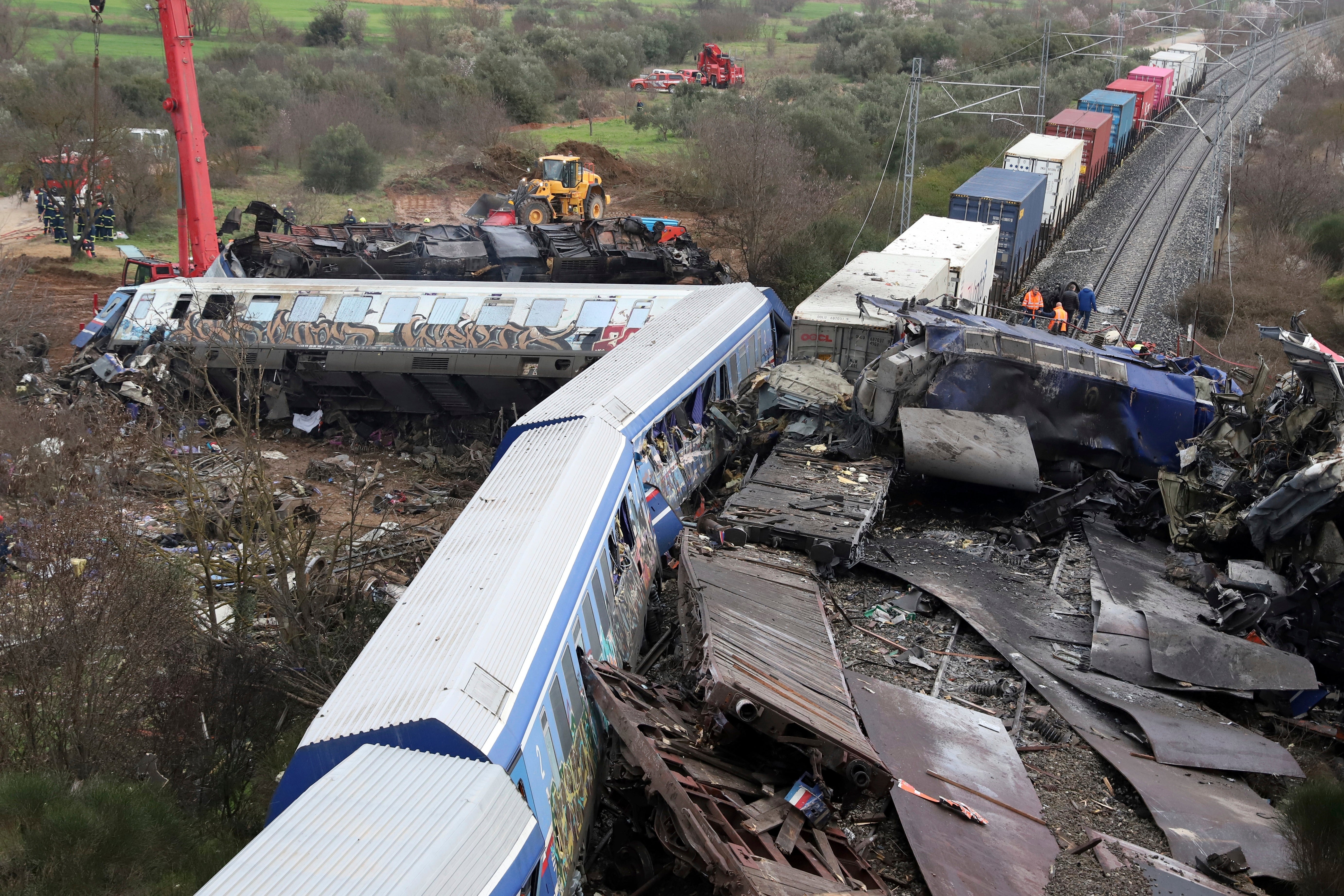 The aftermath of a train crash that killed 57 people in Tempe, north of Athens