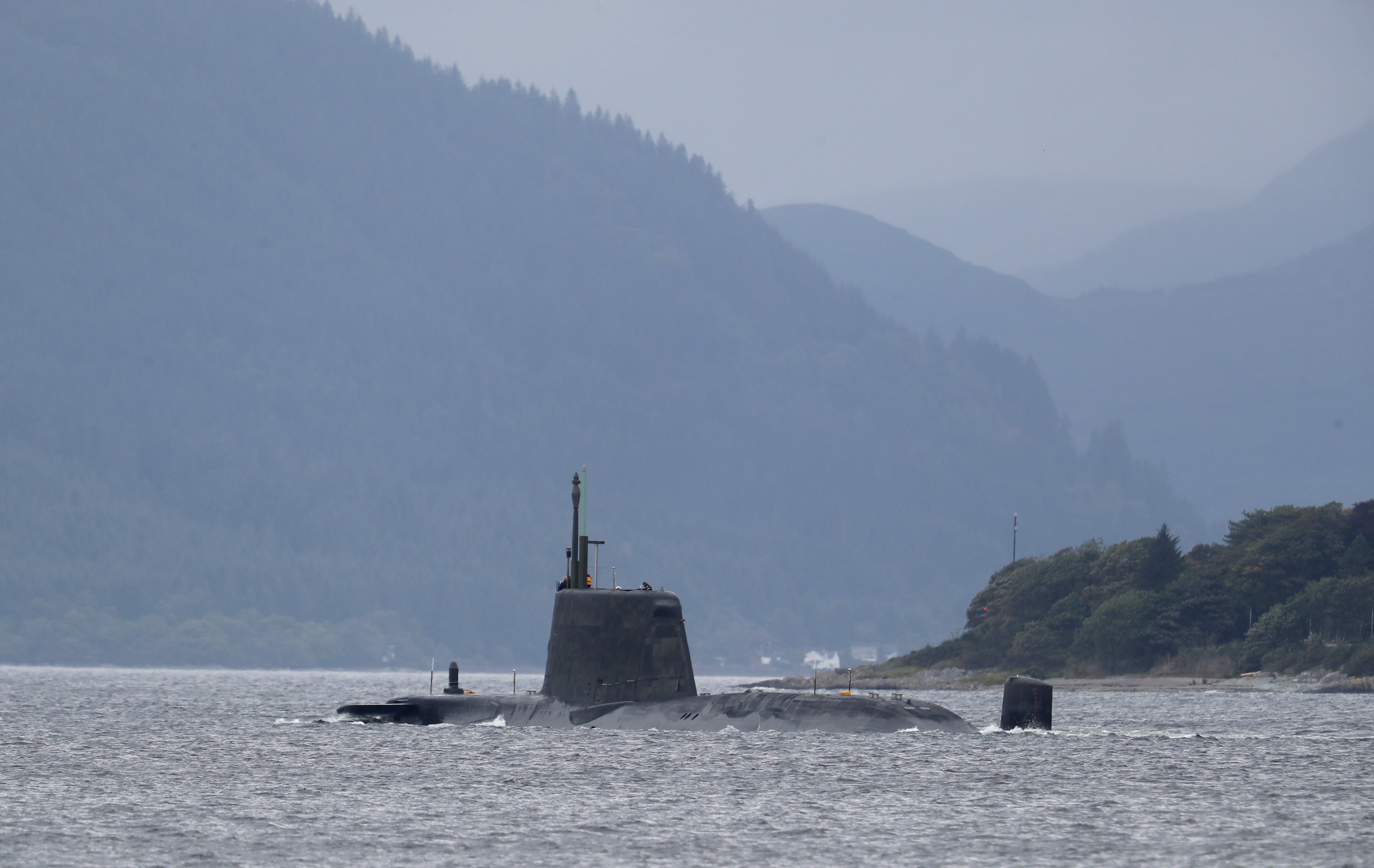 <p>As part of their roles, the workers are responsible for the movement of nuclear submarines in and out of ports (Andrew Milligan/PA)</p>