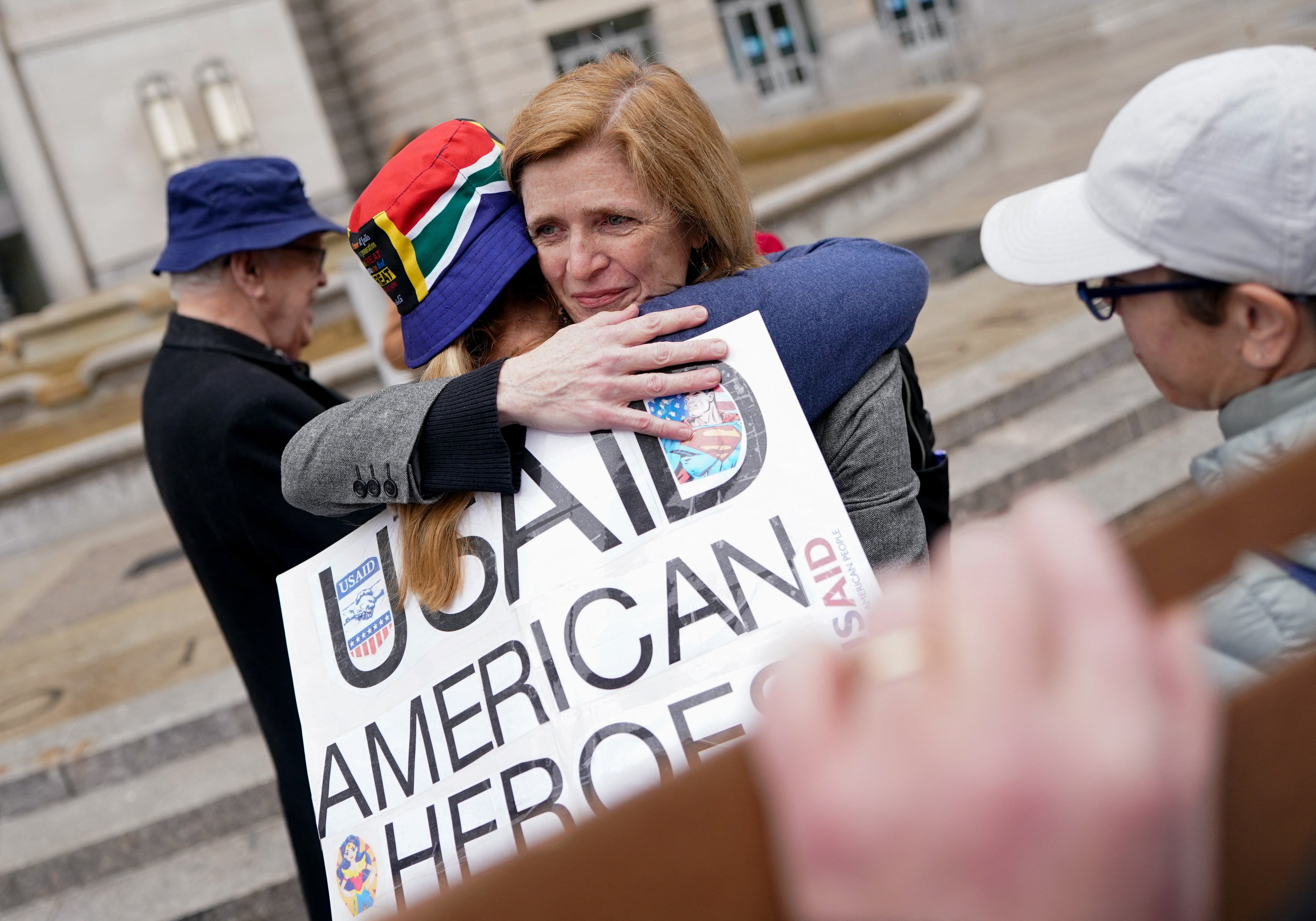 Former U.S. Agency for International Development (USAID) Administrator Samantha Power hugs a person after laid-off USAID workers cleared out their desks and collected personal belongings, during a sendoff in Washington, D.C.