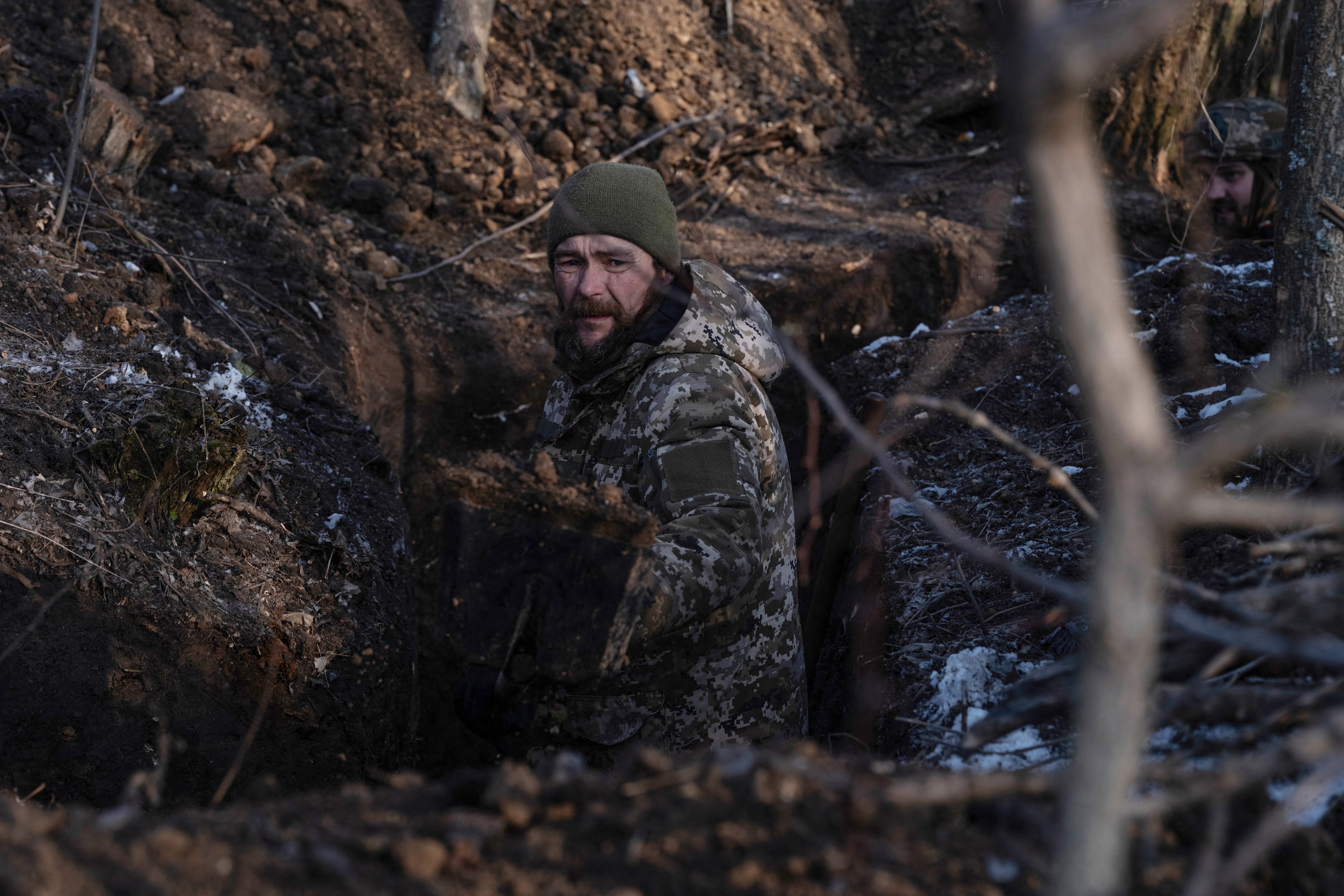 A Ukrainian serviceman digging a trench at an undisclosed location near Kramatorsk on 26 February 2025