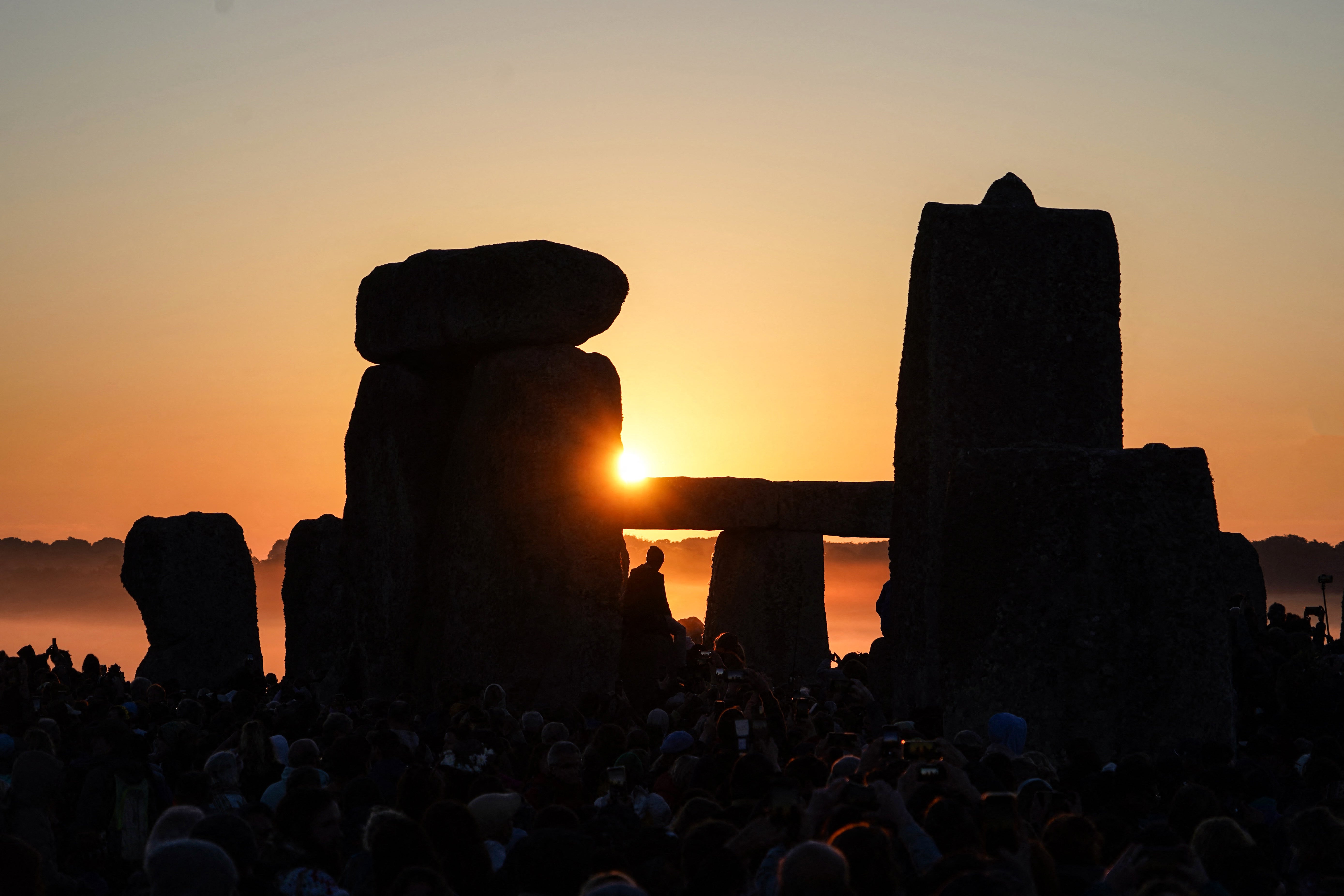 Sun rises at Stonehenge near Amesbury in Wiltshire