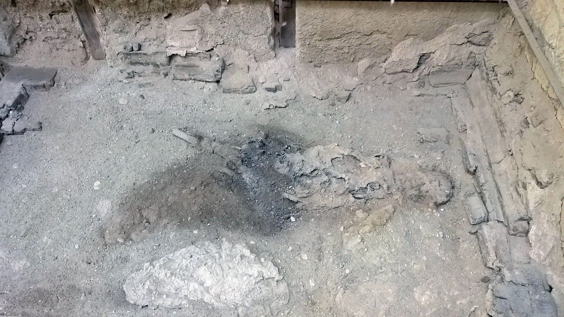 Remains of an individual in their bed at Collegium Augustalium, Herculaneum