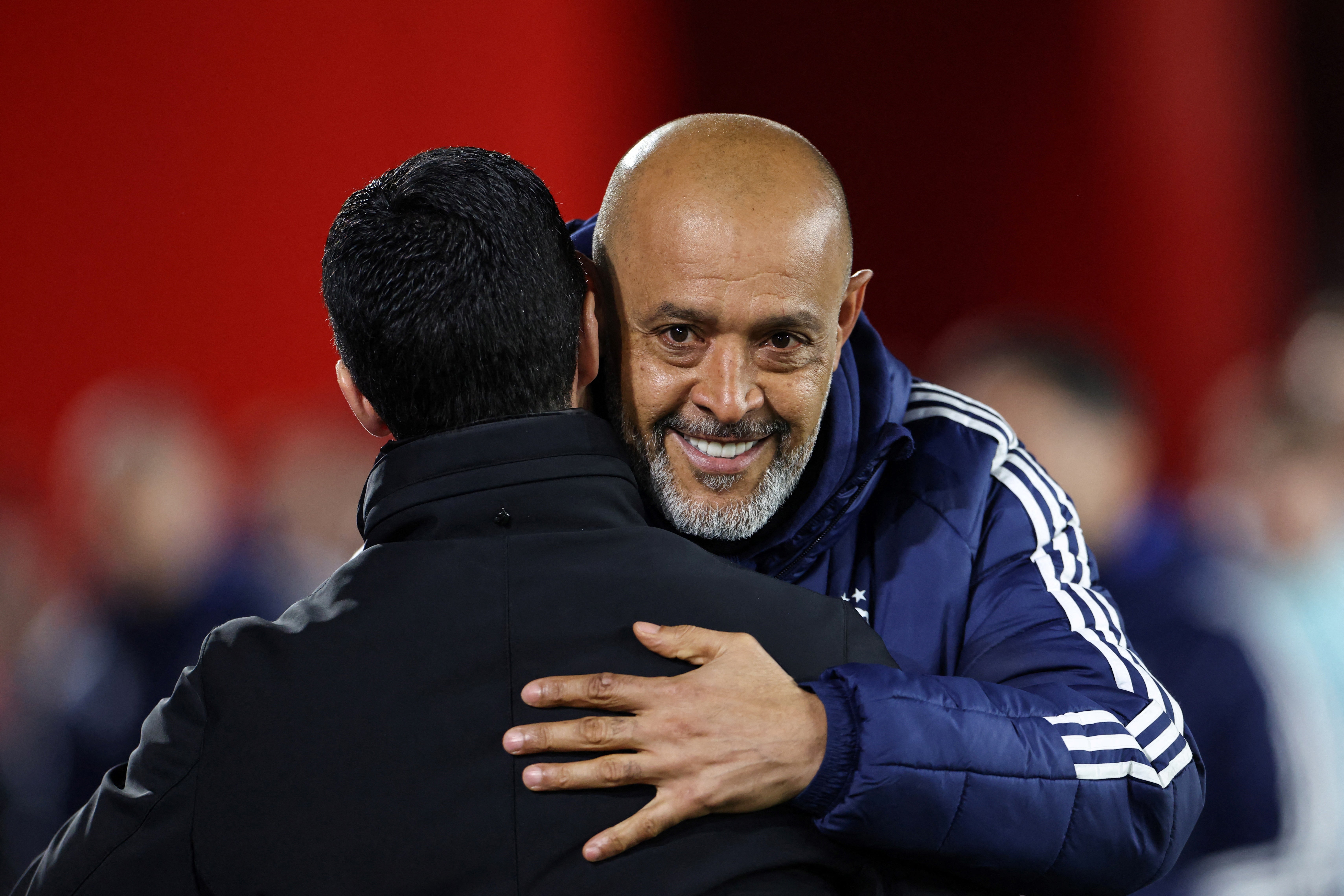 <p>Nuno Espirito Santo embraces Arsenal manager Mikel Arteta before kick-off</p>