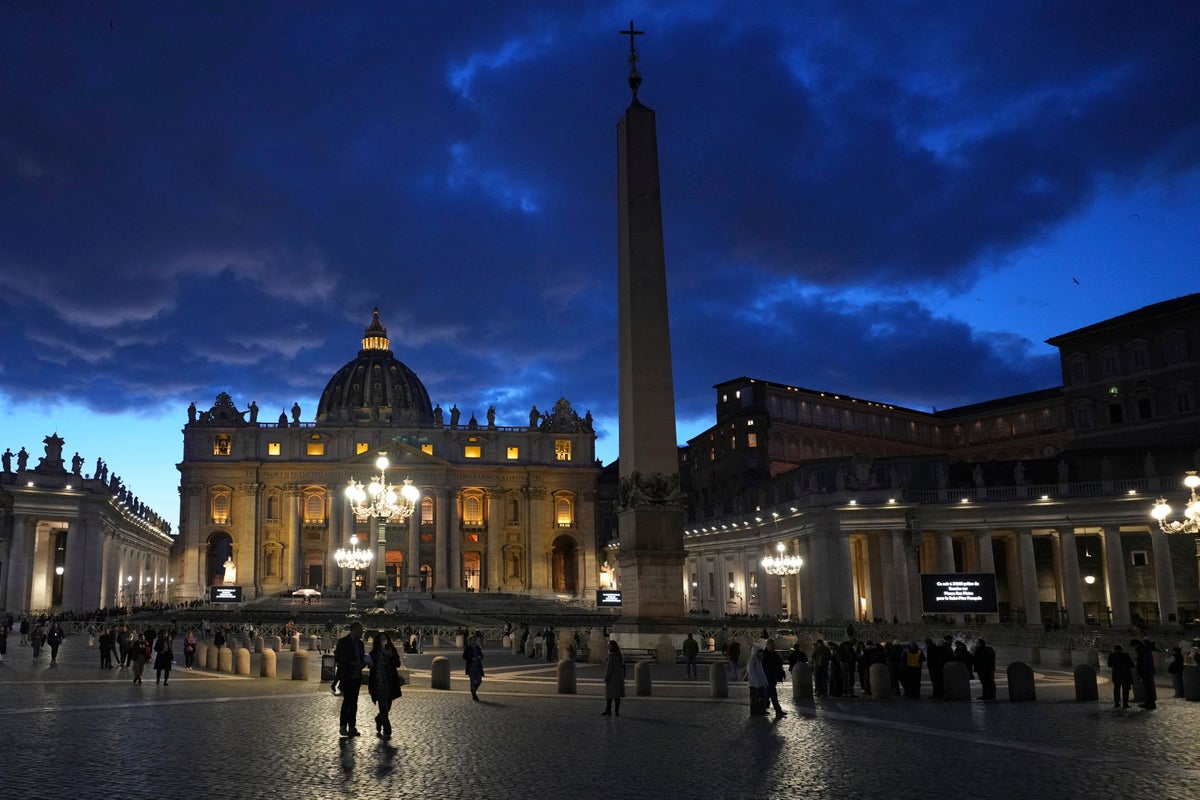 Pope reaches 2-week mark at hospital with pneumonia and doctors suggest he's overcome the worst