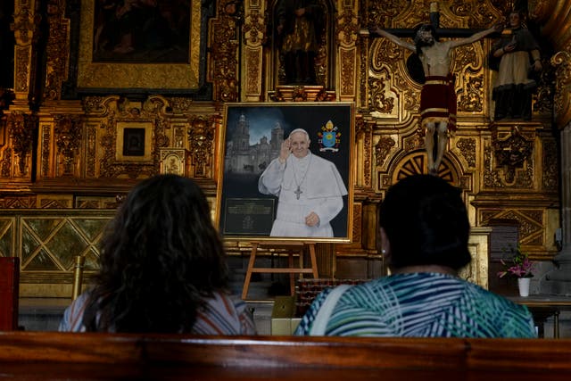 <p>Parishioners pray for the health of Pope Francis at the Metropolitan Cathedral in Mexico City</p>