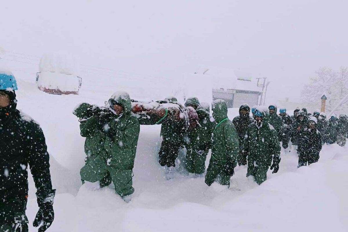 At least 41 workers are trapped after being swept away by an avalanche in northern India