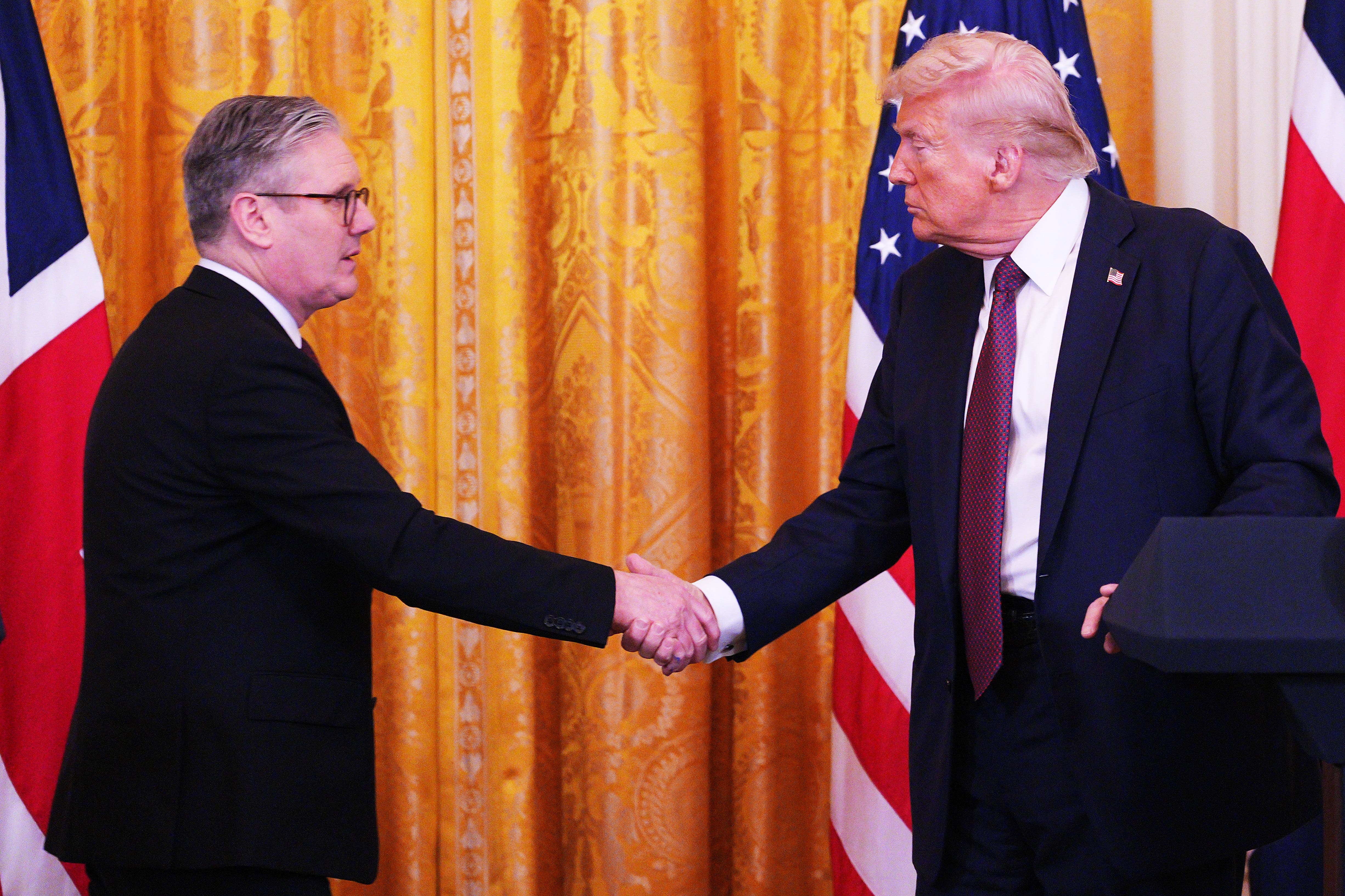 US President Donald Trump and Prime Minister Sir Keir Starmer hold a joint press conference in the East Room at the White House in Washington DC after their meeting in the Oval Office (Carl Court/PA)