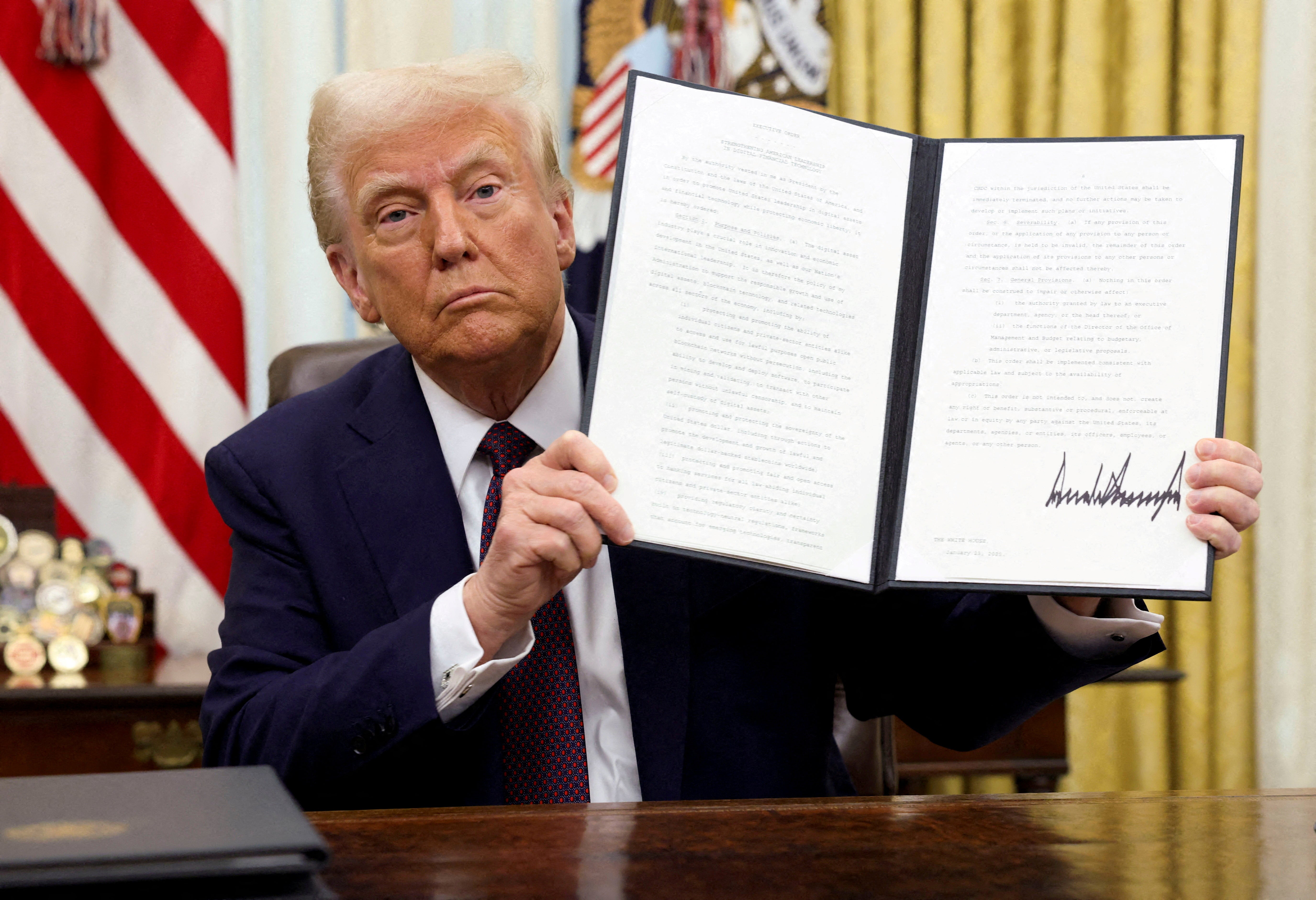 Trump, photographed holding a signed executive order in the Oval Office on January 23, appeared to seize on the Oversight Project’s reports about Biden’s alleged autopen use