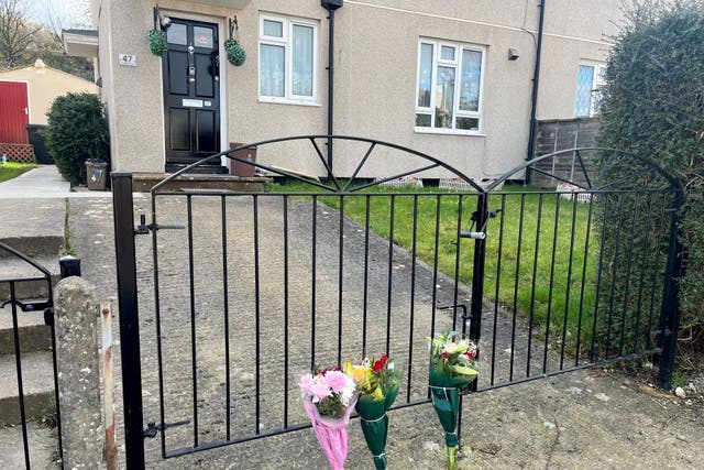 Floral tributes left near the scene on Cobhorn Drive, Hartcliffe, Bristol, where a 19-year-old woman died after she was attacked by a dog on Wednesday night (Rod Minchin/PA)