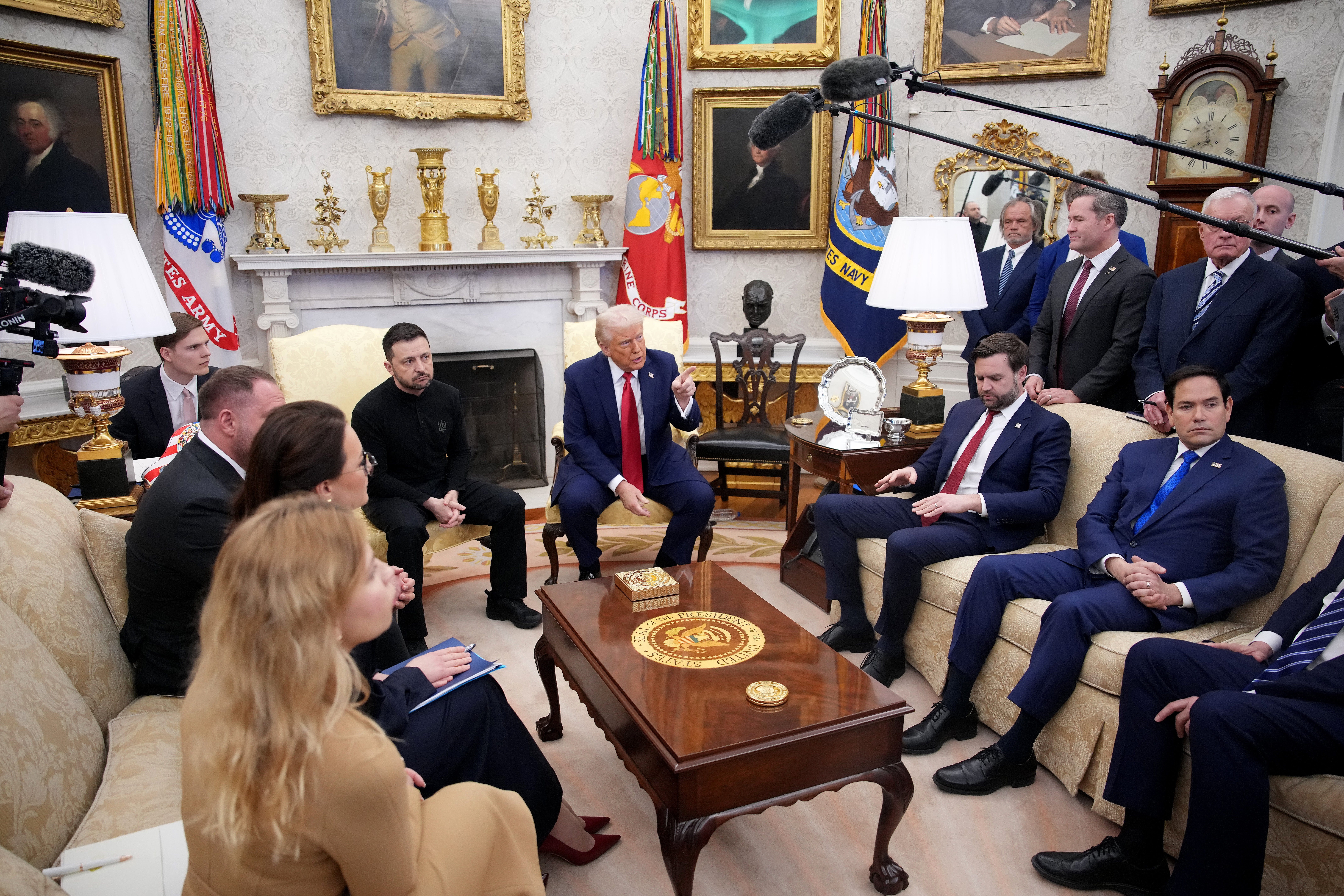 U.S. President Donald Trump and Ukrainian President Volodymyr Zelensky meet in the Oval Office at the White House on February 28, 2025 in Washington, DC. Secretary of State Marco Rubio, pictured next to Vice President JD Vance, pushed back on what he called the “stupid media narrative” that Trump was “bullying” Zelensky into accepting a bad deal