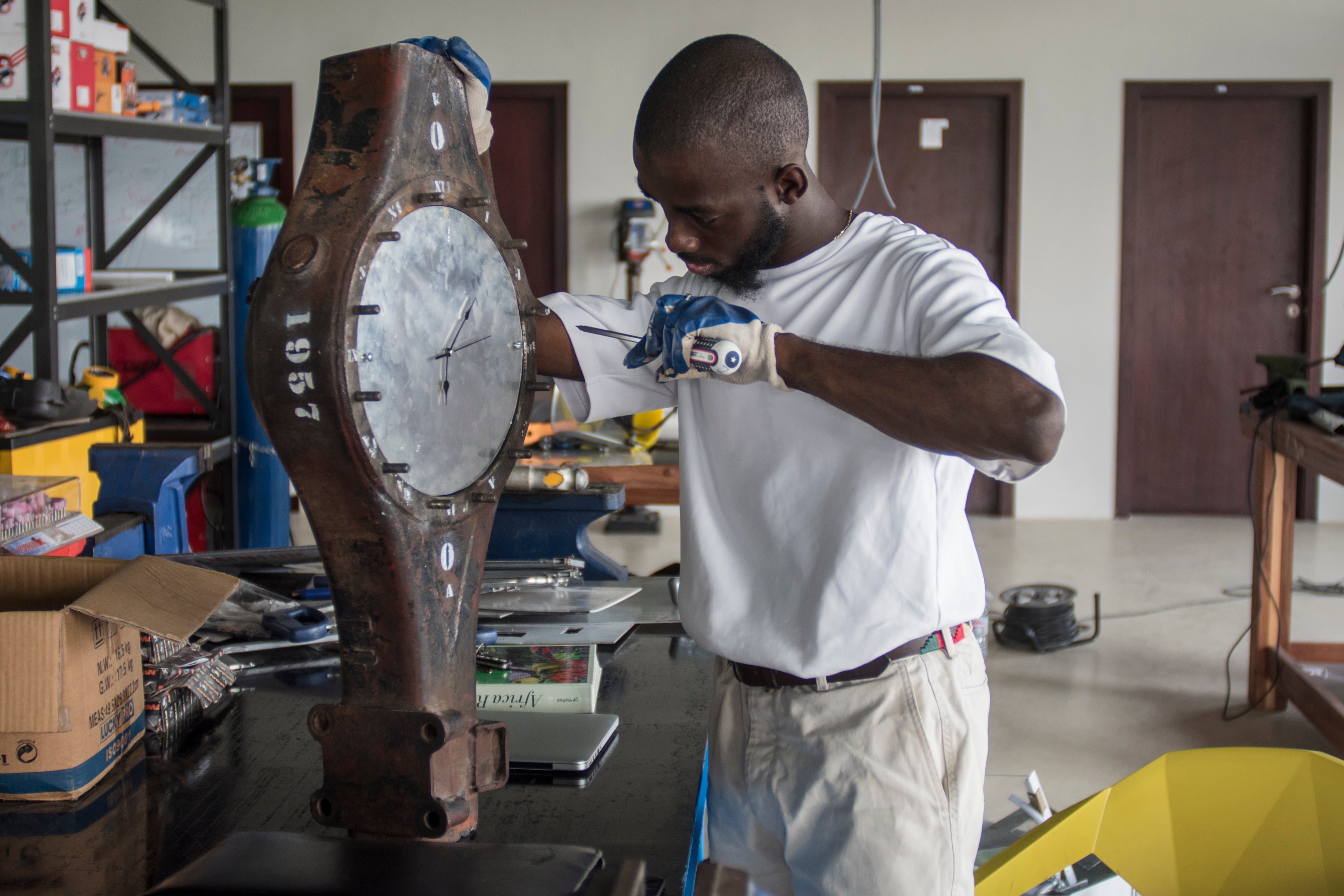 At least four others, including Ghanaian artist Joseph Awuah-Darko, seen here in his workshop outside Accra, have accused Wiley of similar assaults – all of which Wiley has sharply denied