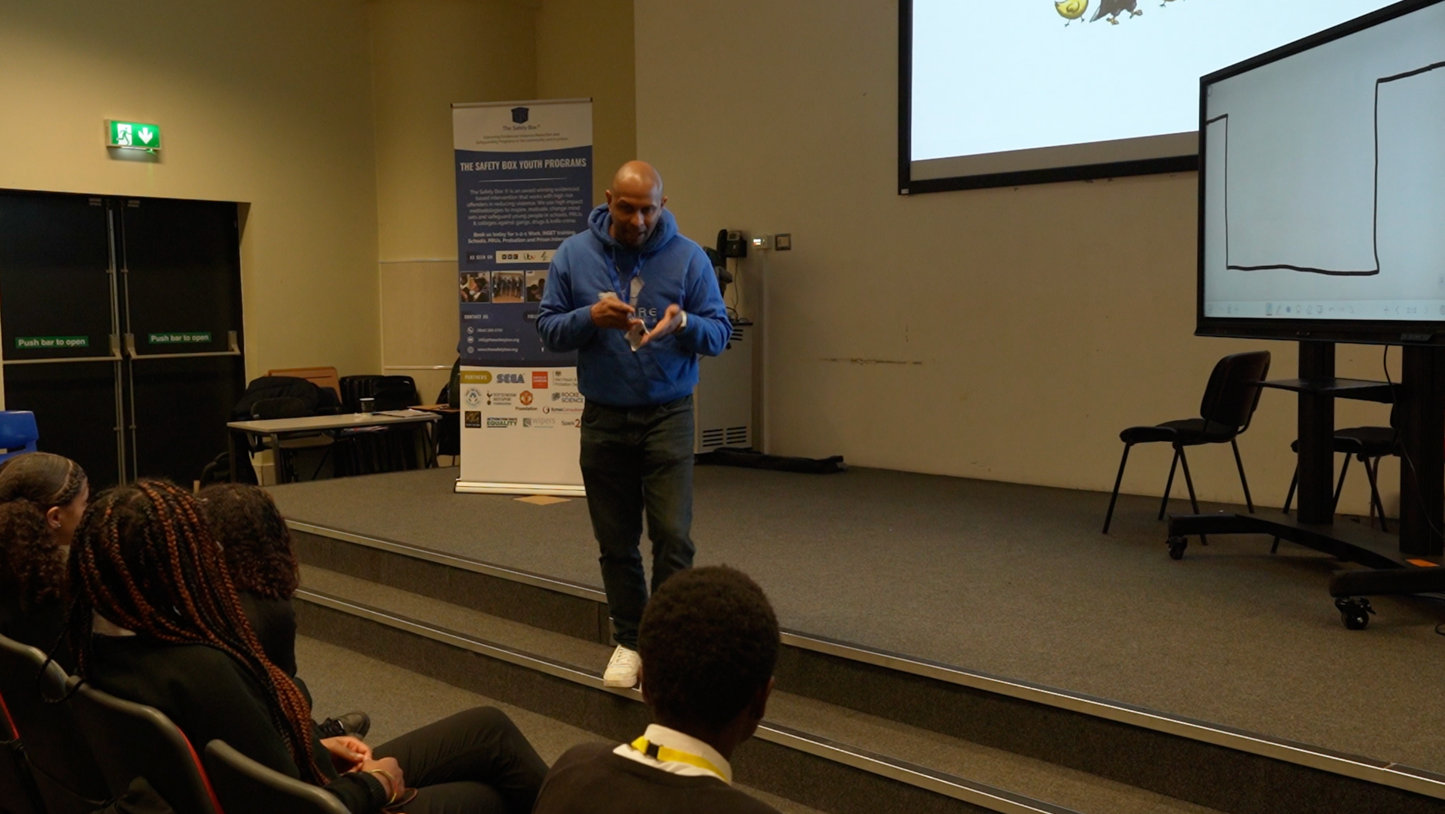 Nathaniel Peat, founder of The Safety Box, speaks to children as part of after-school sessions funded by London’s Violence Reduction Unit