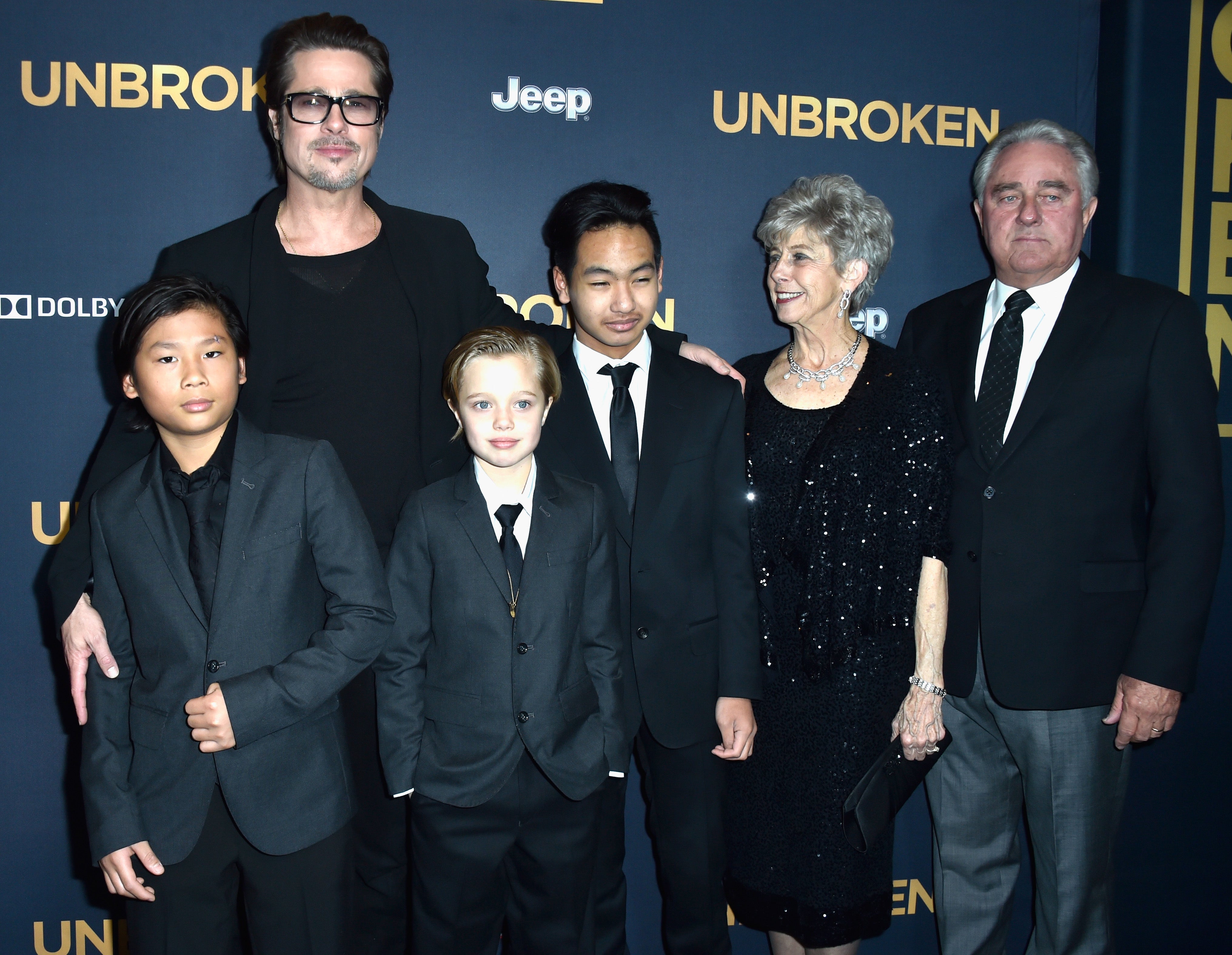 Brad Pitt with his children Pax Thien Jolie-Pitt, Shiloh Nouvel Jolie-Pitt, Maddox Jolie-Pitt and parents Jane Pitt, and William Pitt at the premiere of ‘Unbroken’ in December 2014