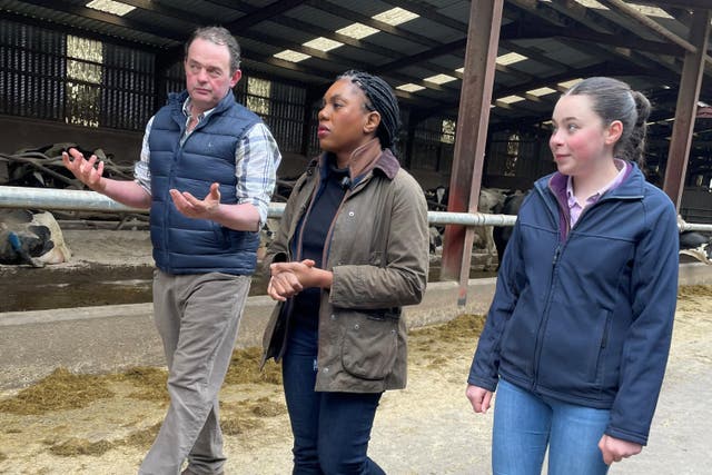 Conservative Party leader Kemi Badenoch with members of the Jackson family during a visit to Fairview Farm in Co Down (Jonathan McCambridge/PA)