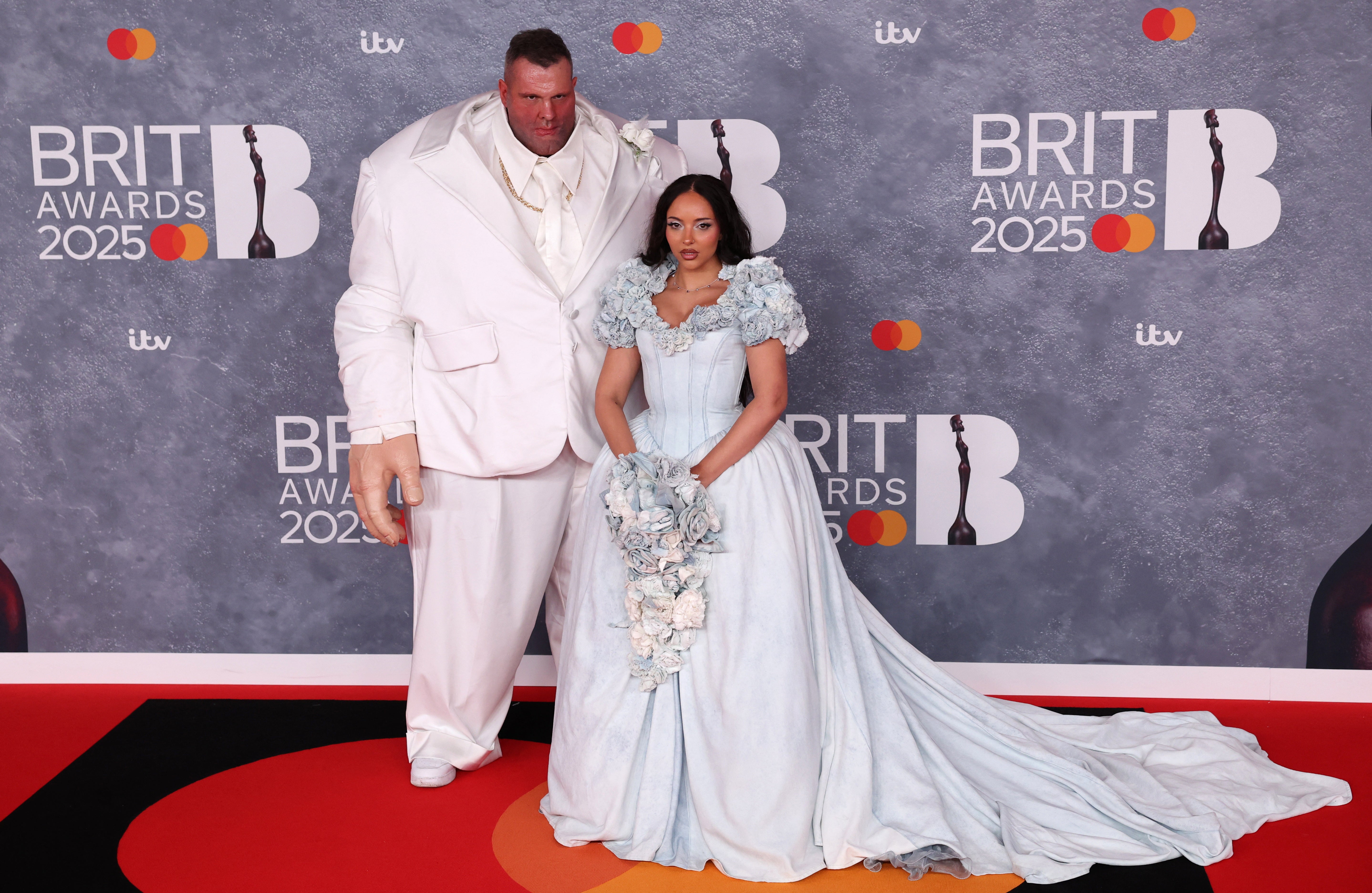 JADE’s ‘groom’ loomed over her in a white suit