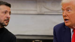 US President Donald Trump talks with Ukrainian President Volodymyr Zelenskiy at the White House