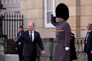Germany's outgoing chancellor Olaf Scholz arrives at Lancaster House