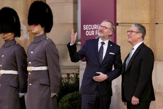British Prime Minister Keir Starmer greets Czech Republic's Prime Minister Petr Fiala as he arrives for a summit on Ukraine at Lancaster House