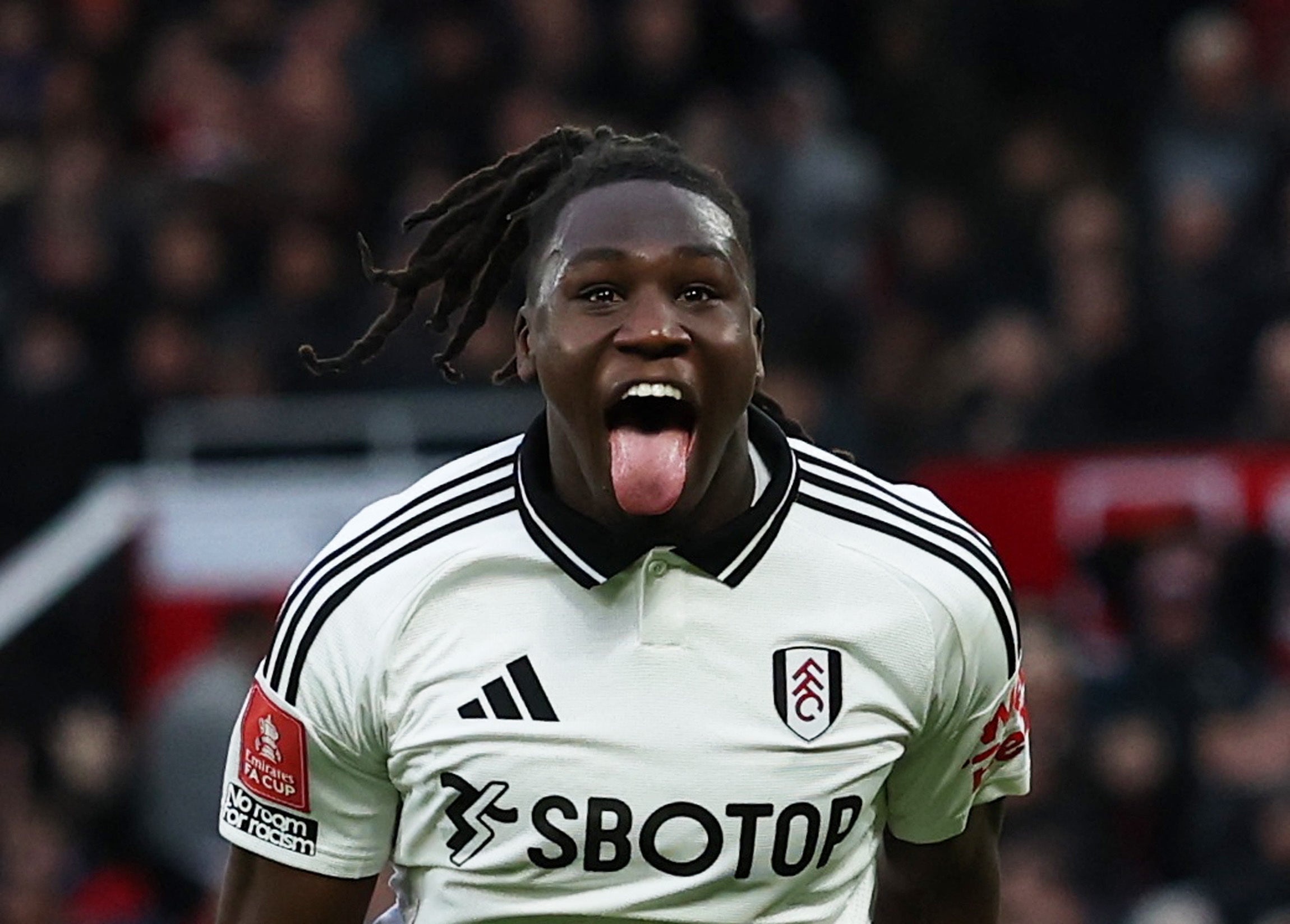 Calvin Bassey celebrates Fulham’s opening goal in the FA Cup win at Old Trafford