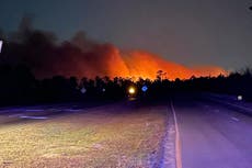 Crews battle wildfires in North and South Carolina amid dry conditions and gusty winds