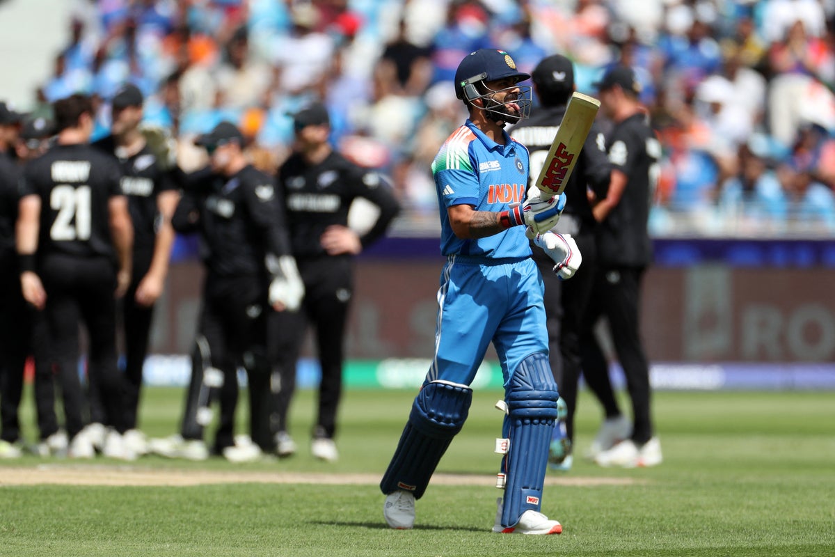 Virat Kohli falls to stunning catch as India battle New Zealand in Champions Trophy