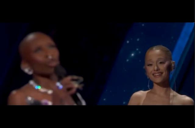 <p>Ariana Grande lovingly looks at Cynthia Erivo during the Oscars’ opening</p>