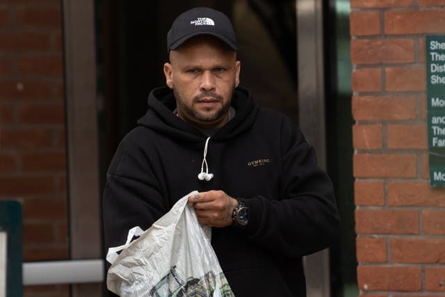 <p>Graham Marshall leaves Sheffield Crown Court</p>