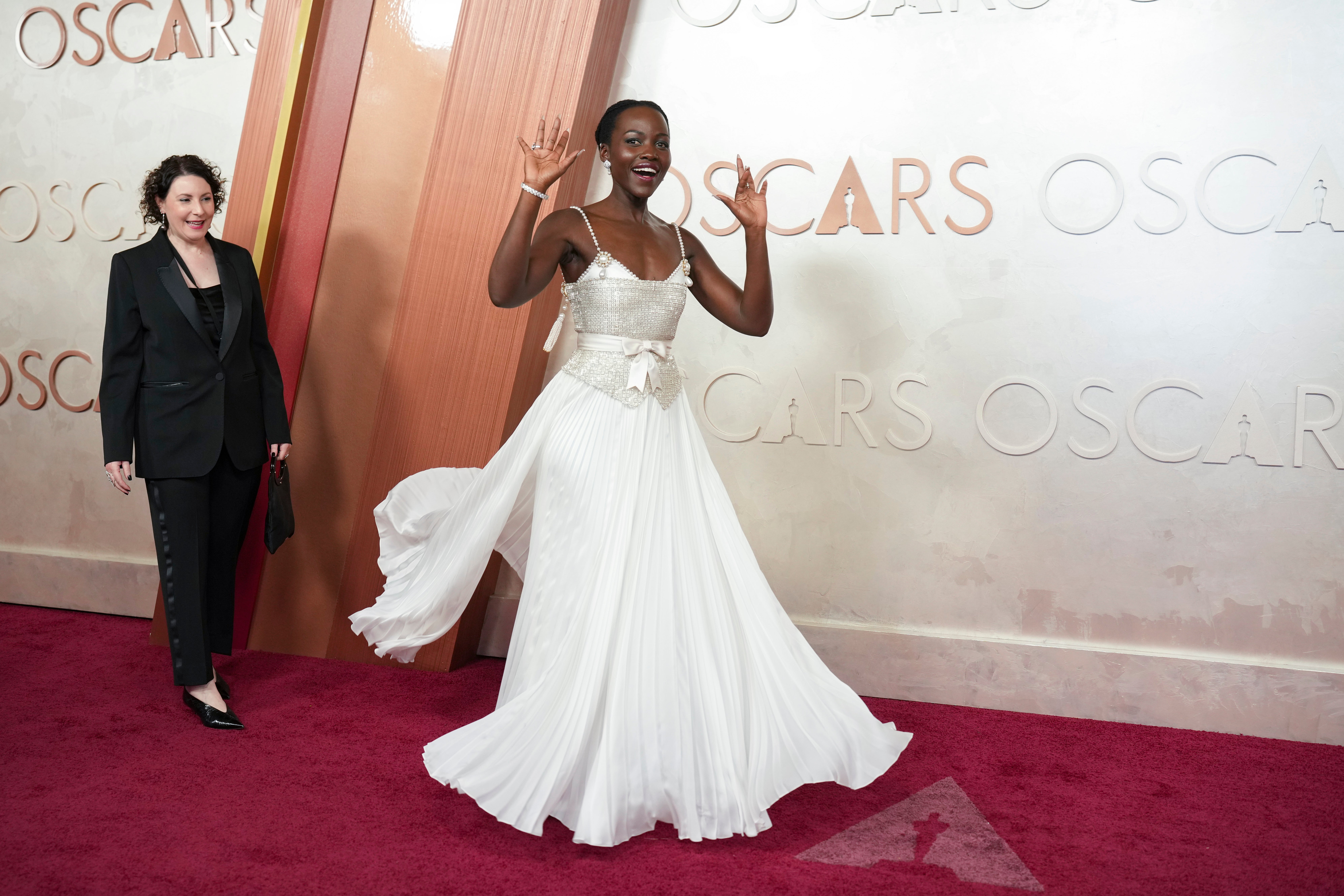 Her dress had more than 22,000 pearls on it as it flashed as she walked the red carpet