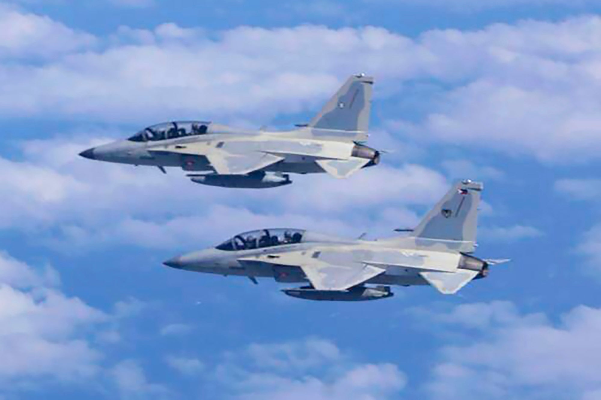 File. Philippine Air Force FA-50 jets fly during a joint patrol and training session with the US over the South China Sea on 4 February 2025