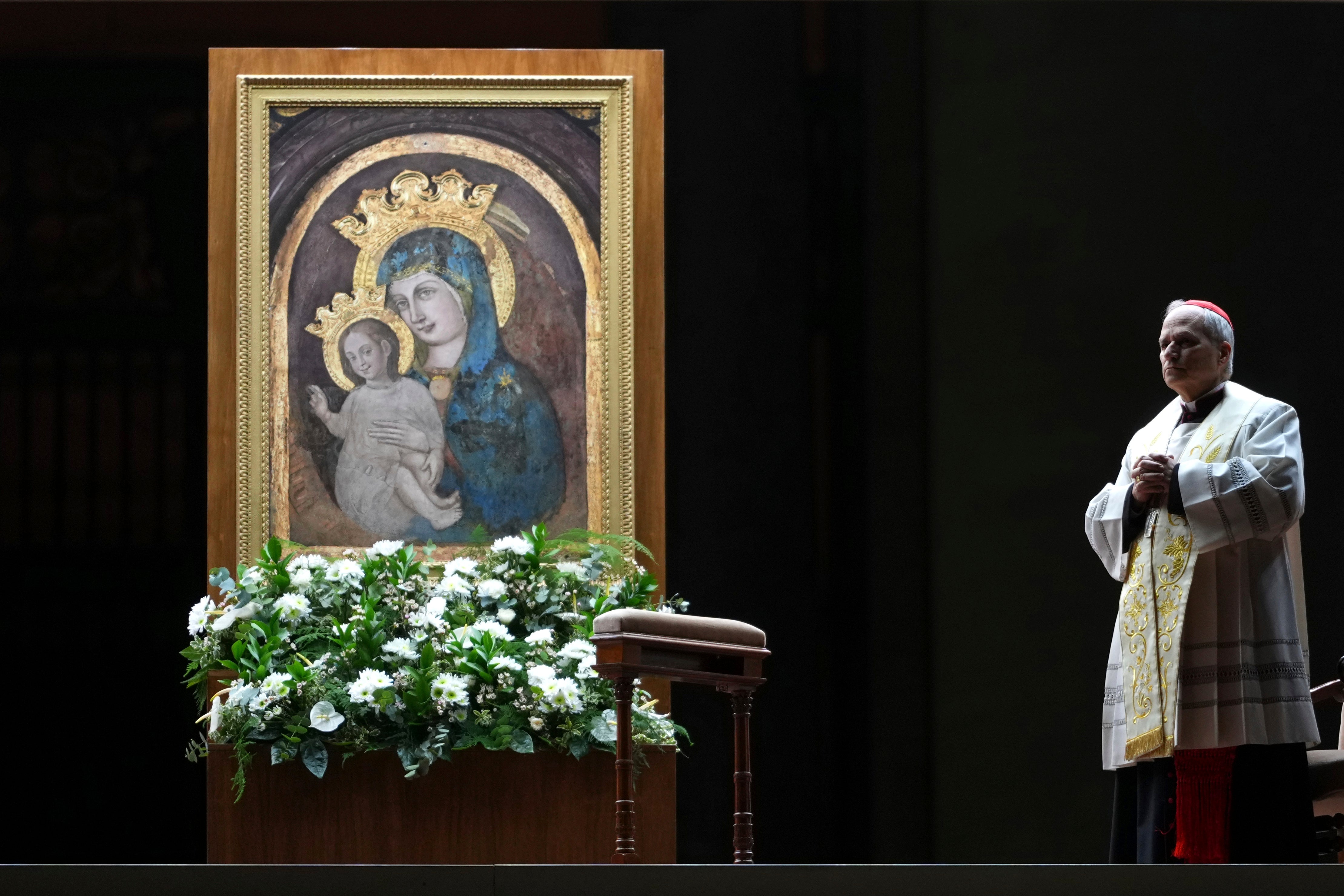 Robert Francis Prevost leads the recitation of the Holy Rosary for Pope Francis' health in St Peter's Square prior to the last Pope’s death