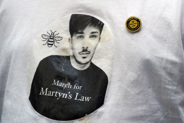 The image of Martyn Hett, a victim of the Manchester Arena bombing, on a T-shirt (Peter Byrne/PA)