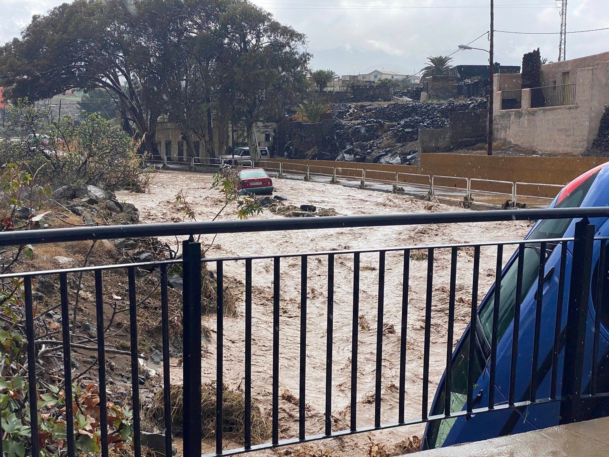 A car that was swept away by the rain, in the Las Bachilleras ravine, in Telde, on the island of Gran Canaria