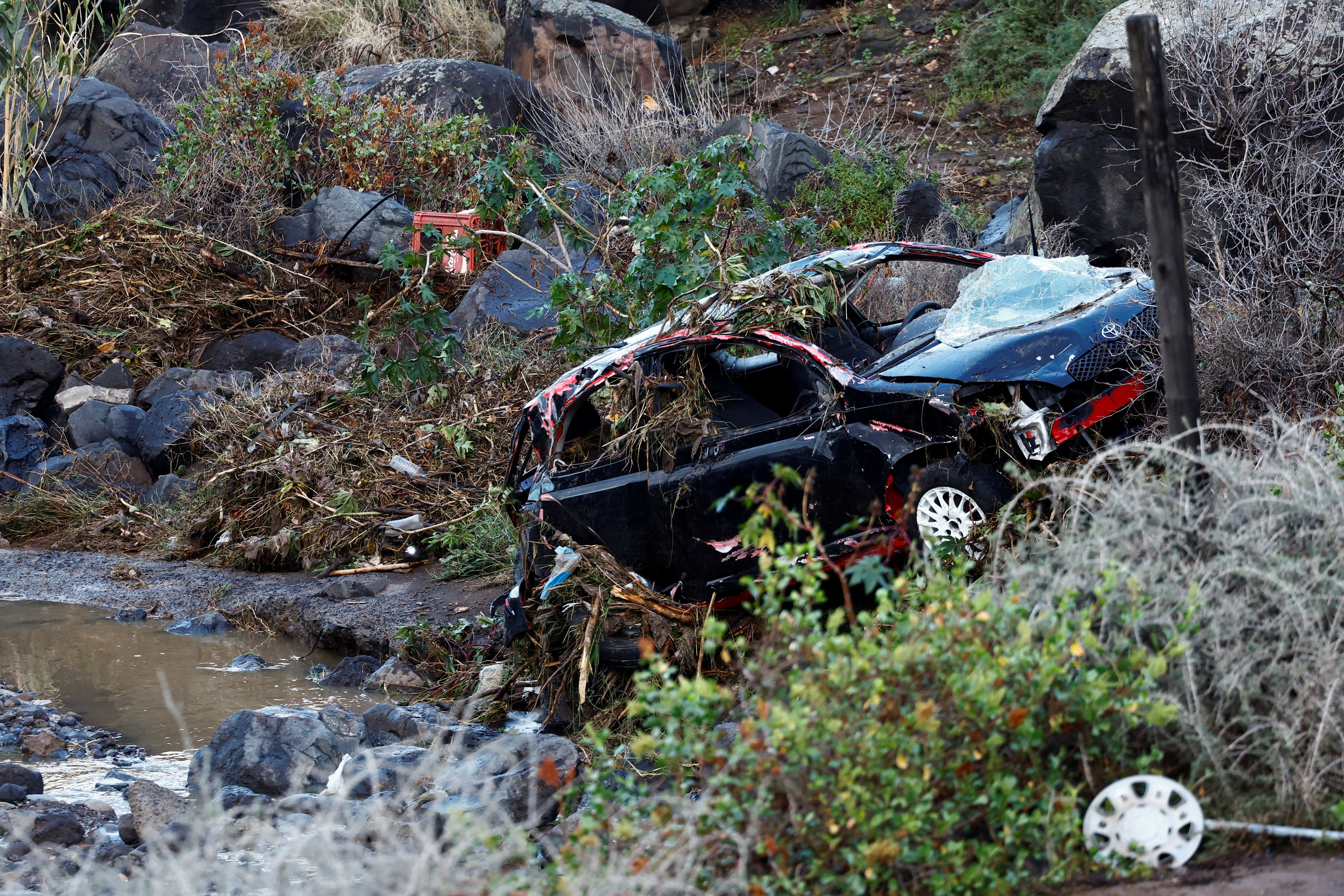 A car that was swept away by the rain in Telde