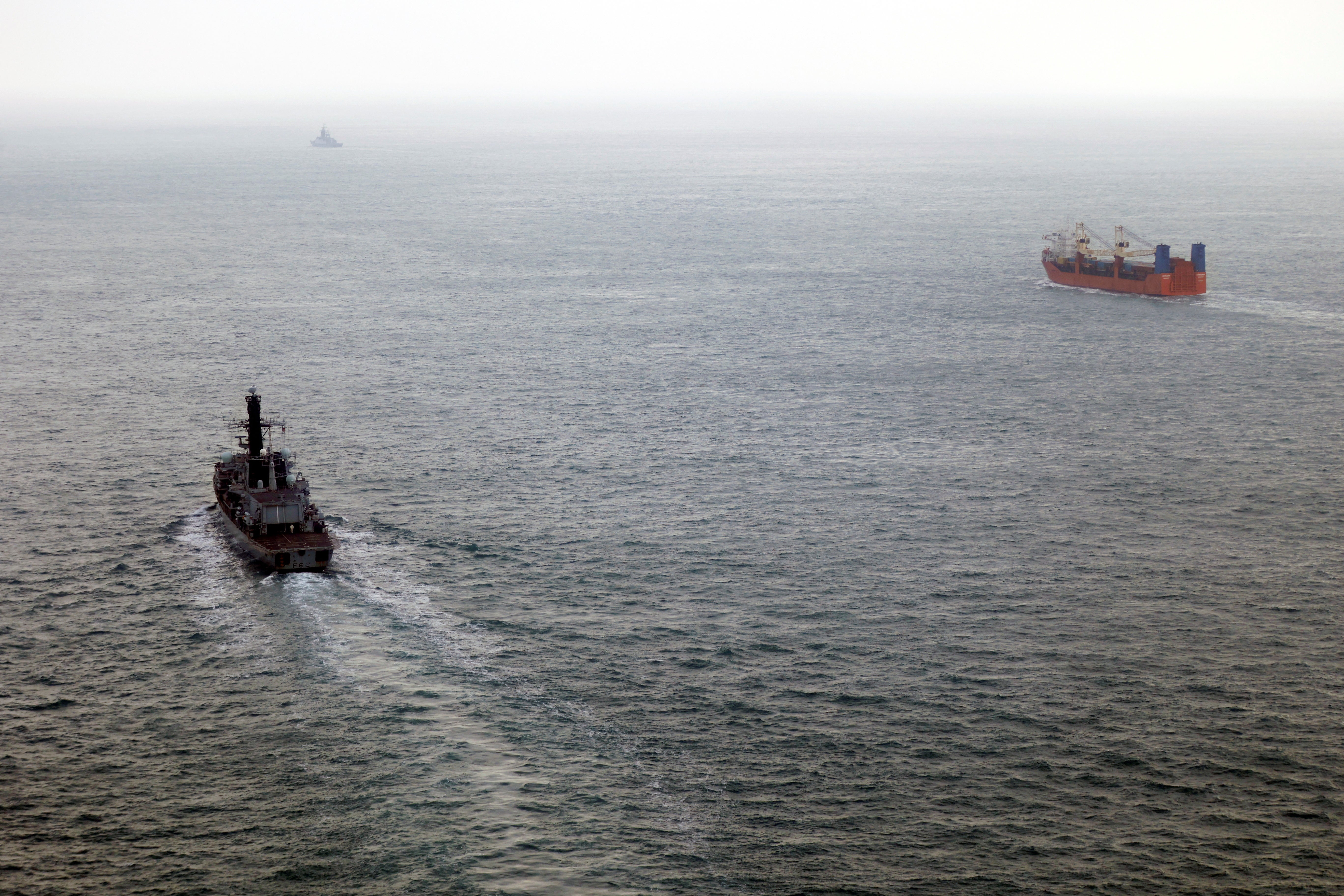 Royal Navy frigate HMS Somerset (left) monitors the movement of, what the Royal Navy said, was the Russia's Boikiy warship escorting the merchant vessel Baltic Leader through UK waters