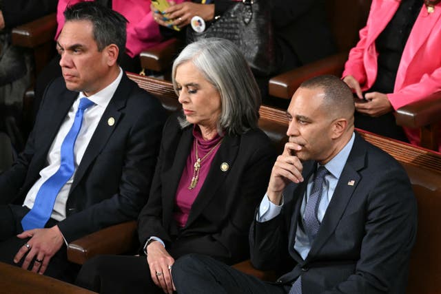 <p>Members of House Democratic leadership including Katherine Clark, center, and Hakeem Jeffries, right, attend Donald Trump's State of the Union address.</p>