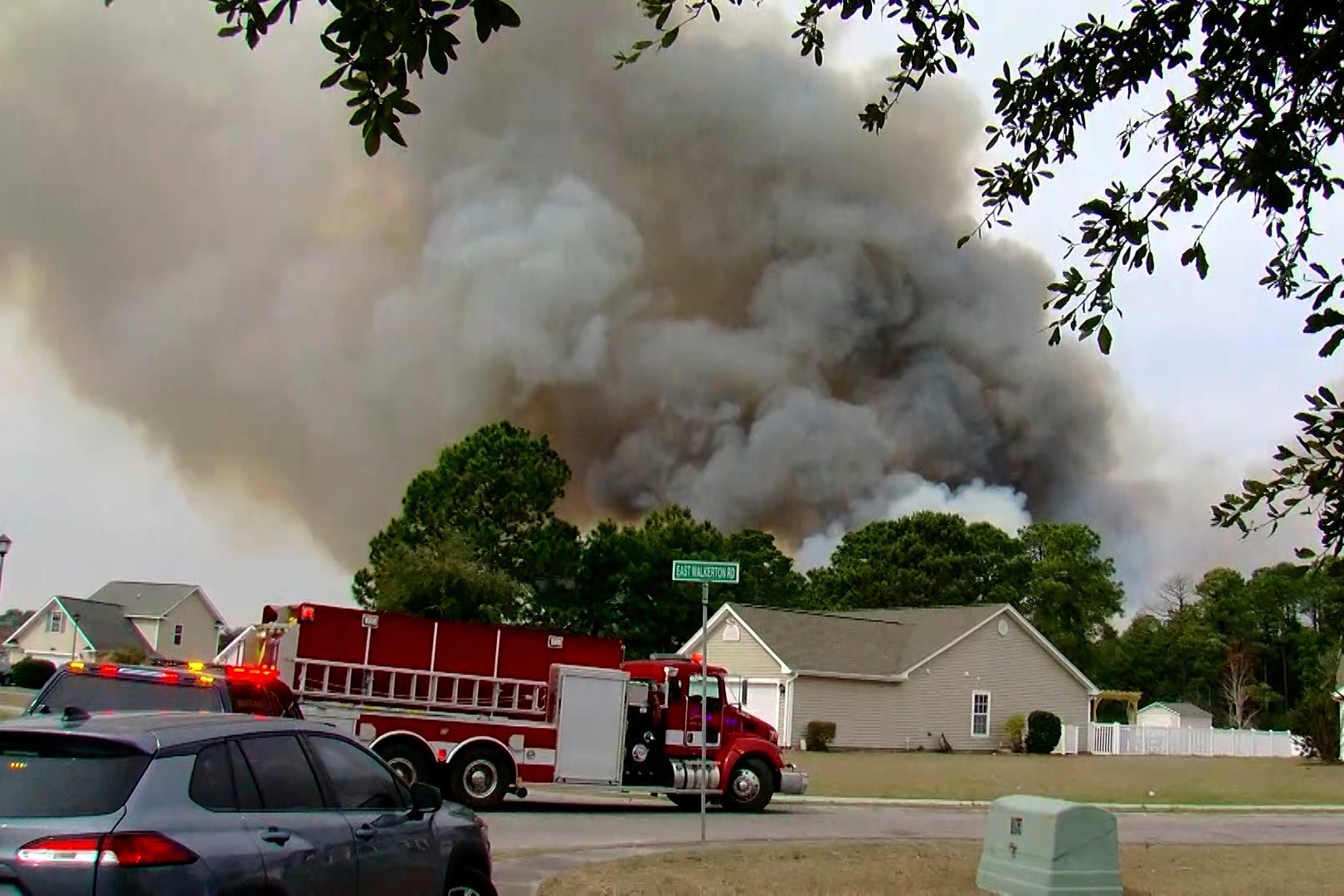 Crews work to contain a fire in the Carolina Forest area west of the coastal resort city of Myrtle Beach