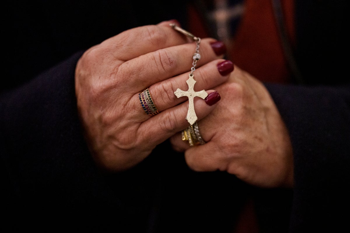 Clutched by the global faithful and draped on candles and statues, rosaries abound for Pope Francis