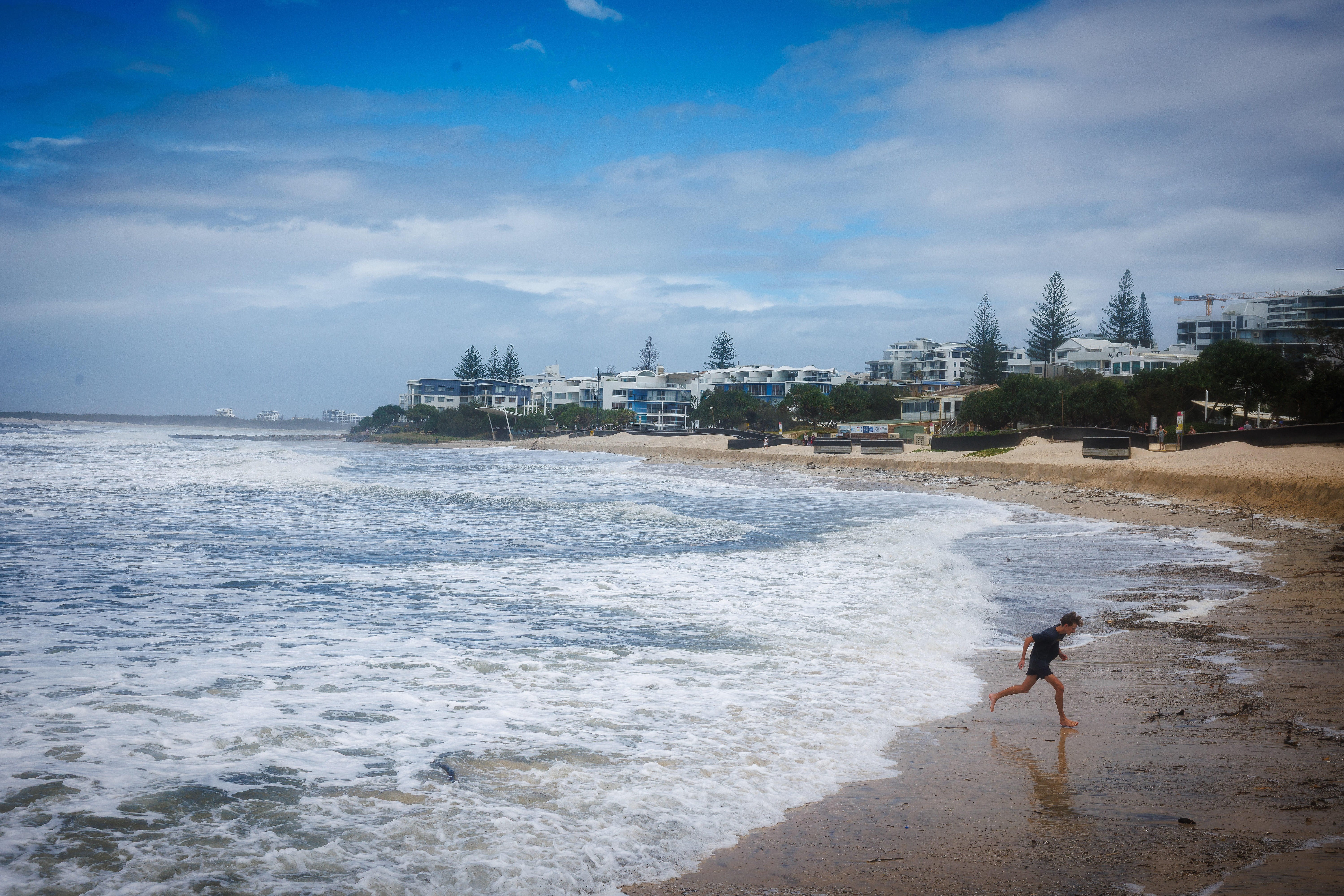 Children play at Kings Beach, Caloundra on the Sunshine Coast, north of Brisbane on 6 March 2025