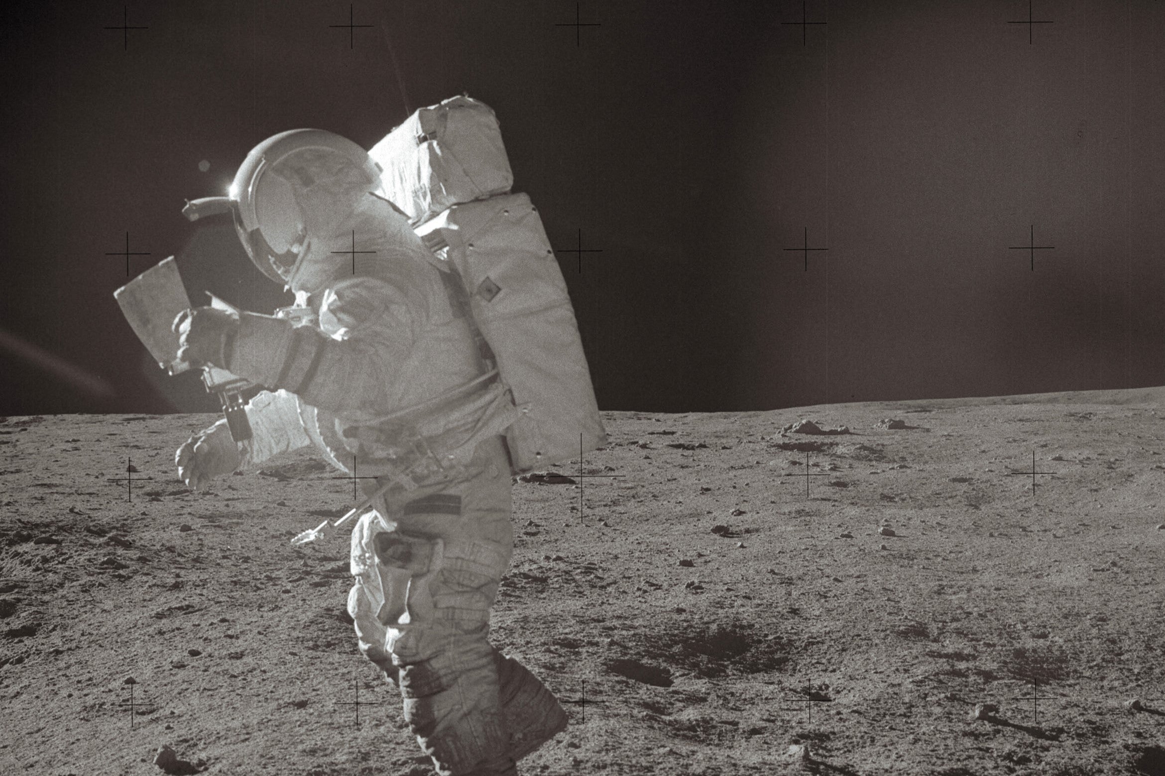 A picture taken on 6 February, 1971 shows Astronaut Edgar Mitchell moving across the lunar surface while looking over a traverse map. Nasa says future astronauts will be able to use GPS navigation on the Moon